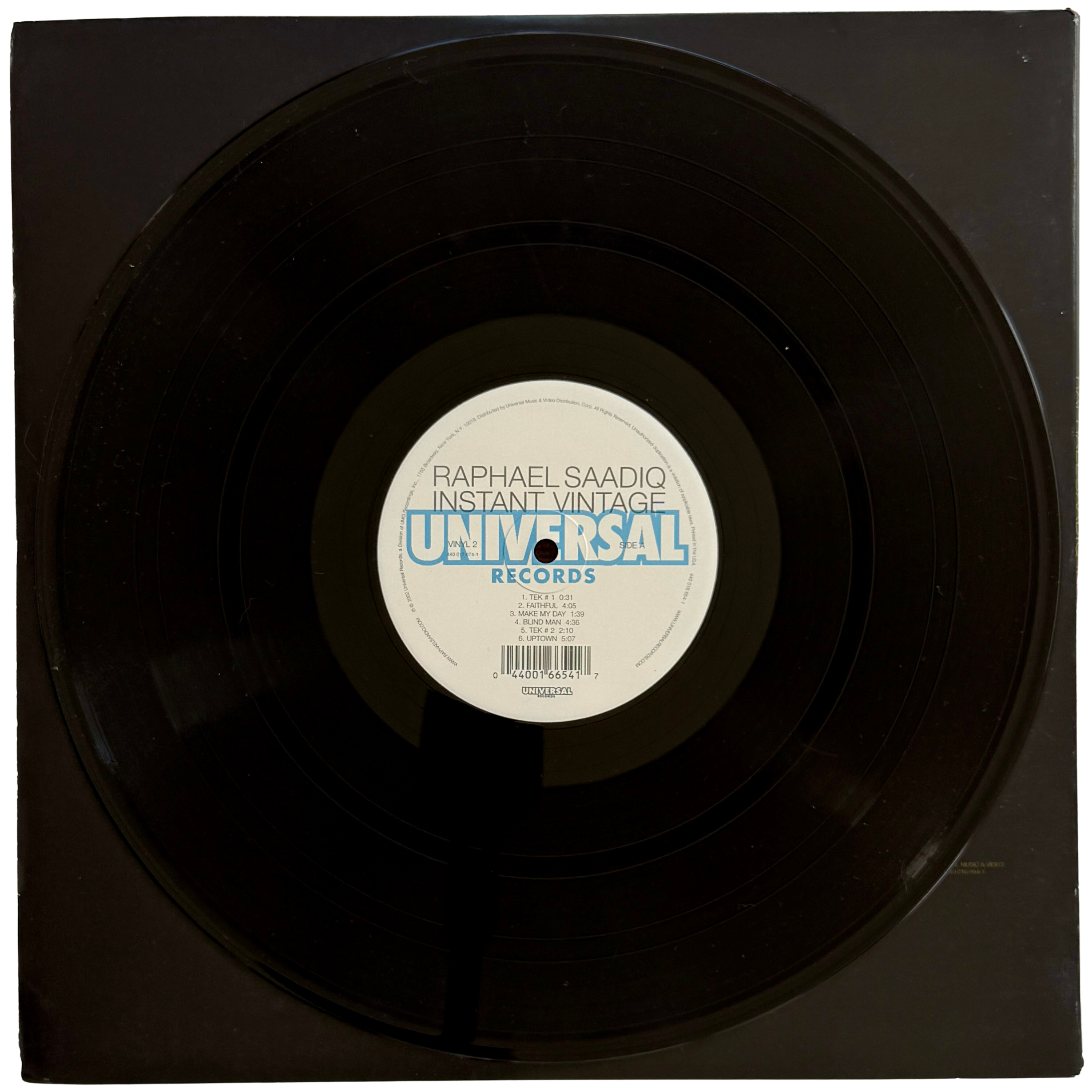 34_raphael saadiq_side 3_vinyl record.png
