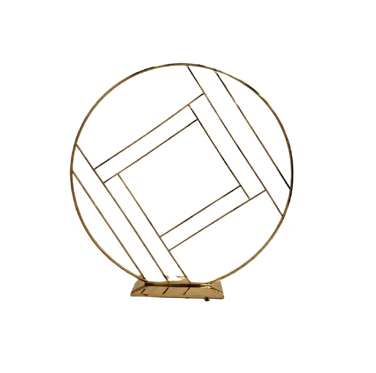 Decorative round metal sculpture with geometric pattern on a small stand.