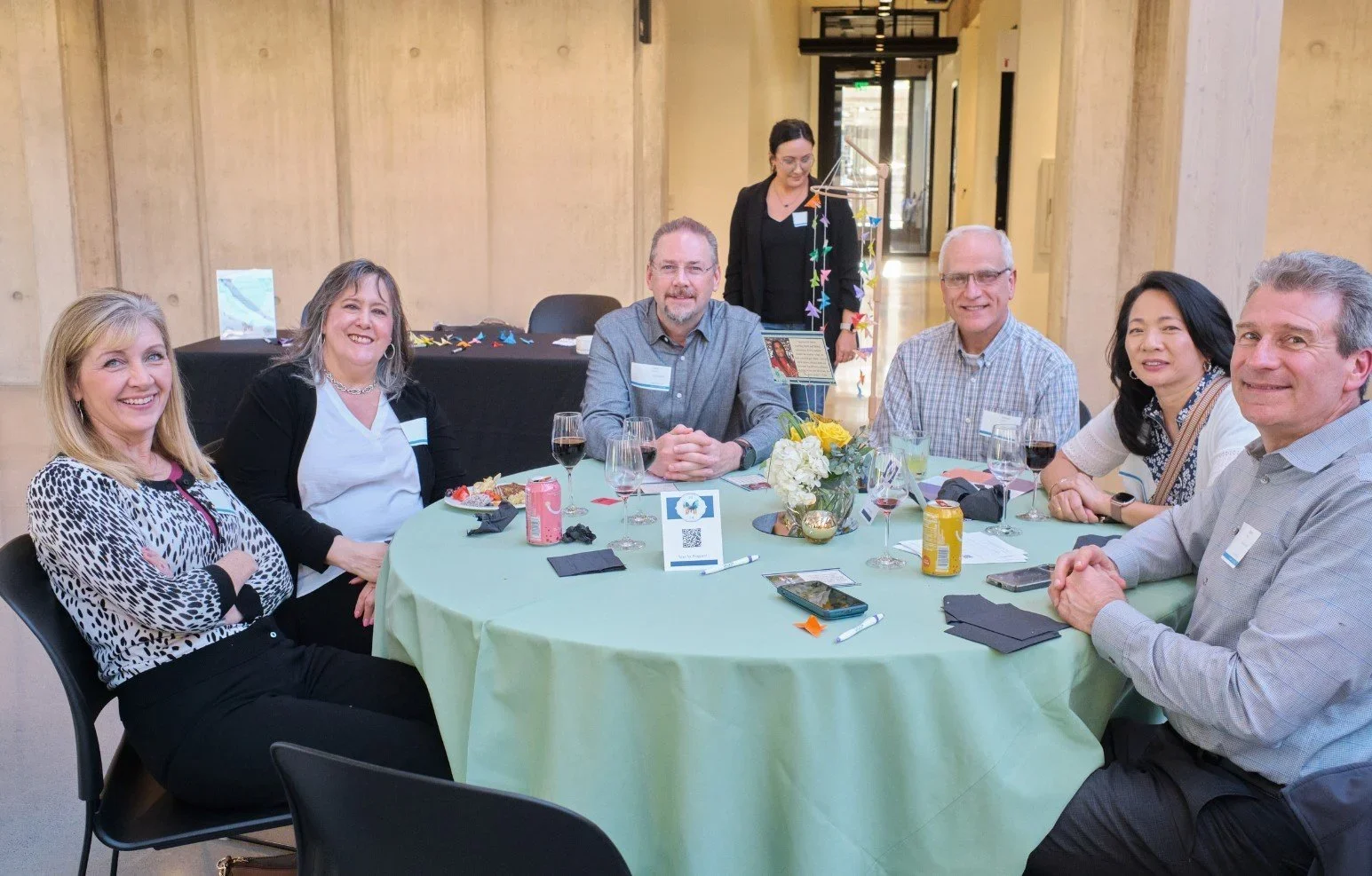 Community members gathered at Cocoon House event in Snohomish County, sharing conversation and supporting youth programs