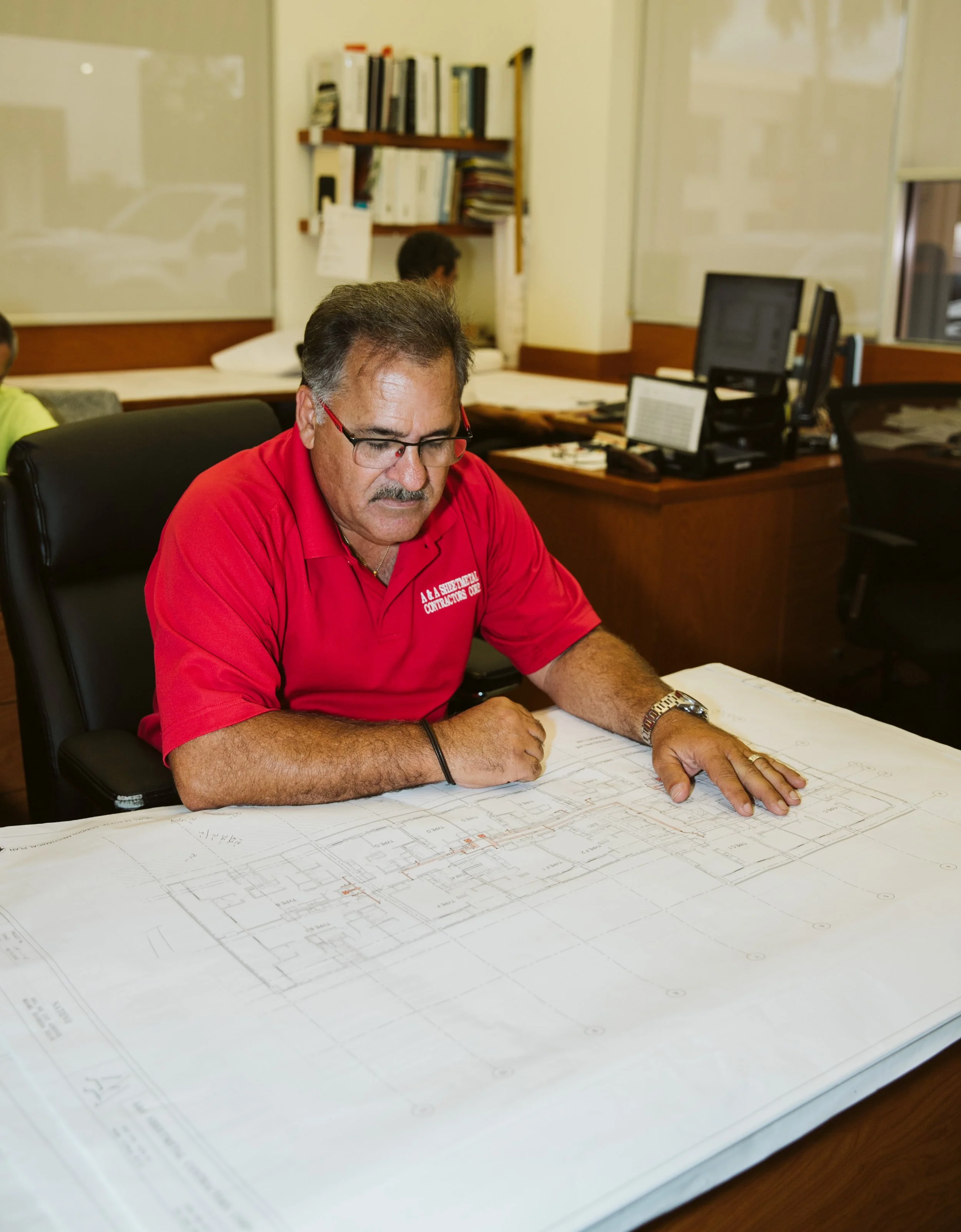 Sheet metal team collaborating on a fabrication project