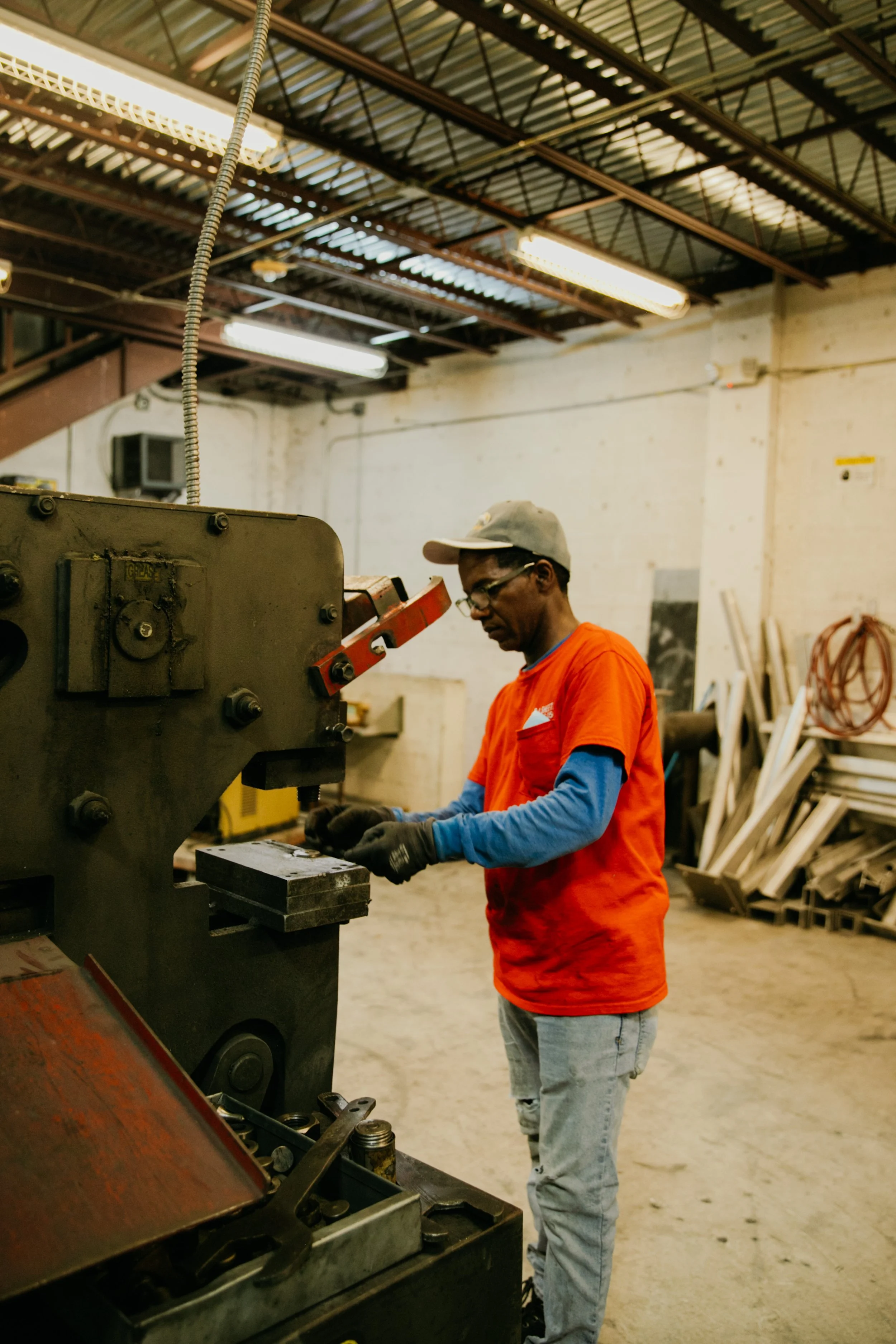 Photographer capturing workflow and craftsmanship in sheet metal business