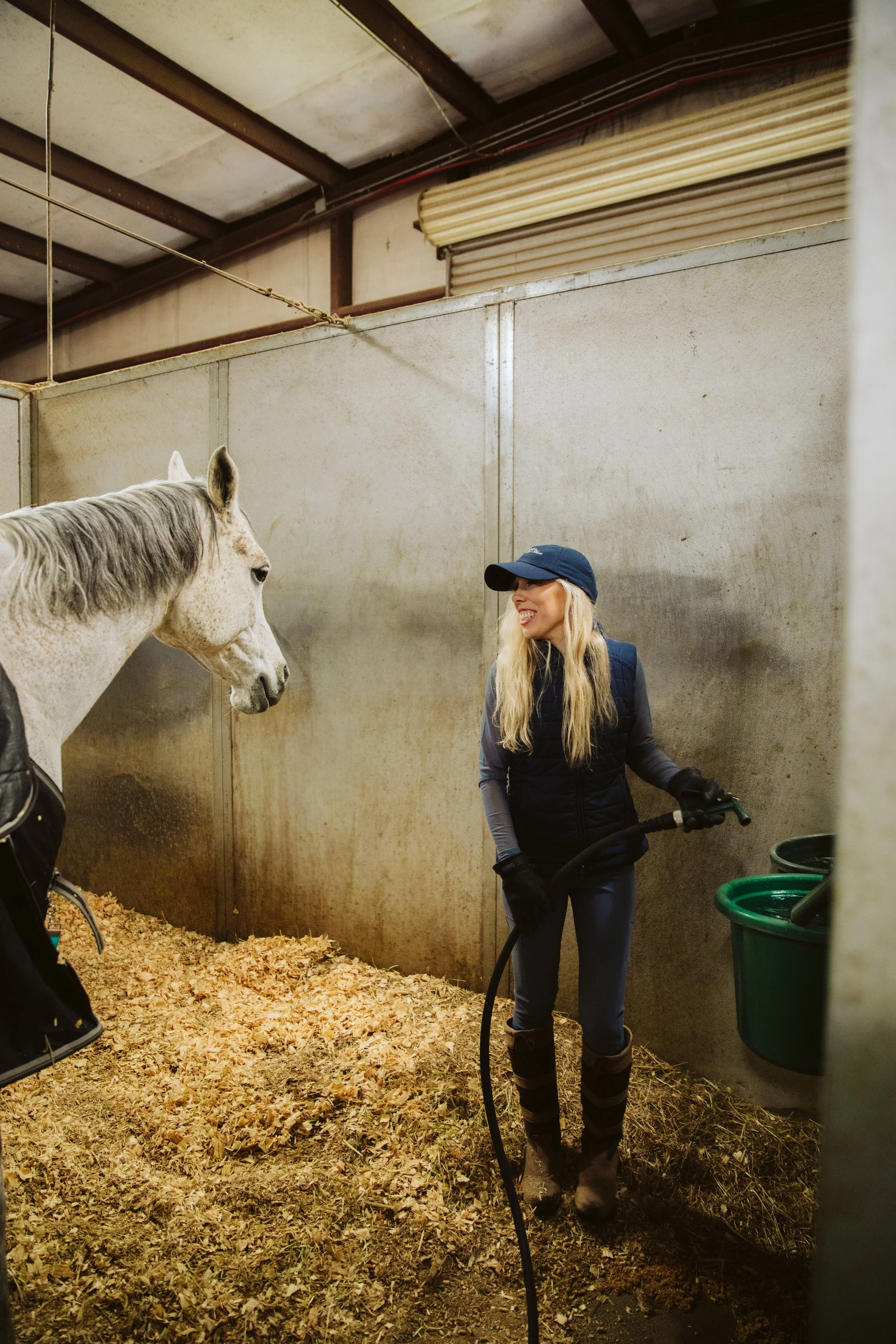 Cleaning Stalls at a Georgia Horse Boarding Barn