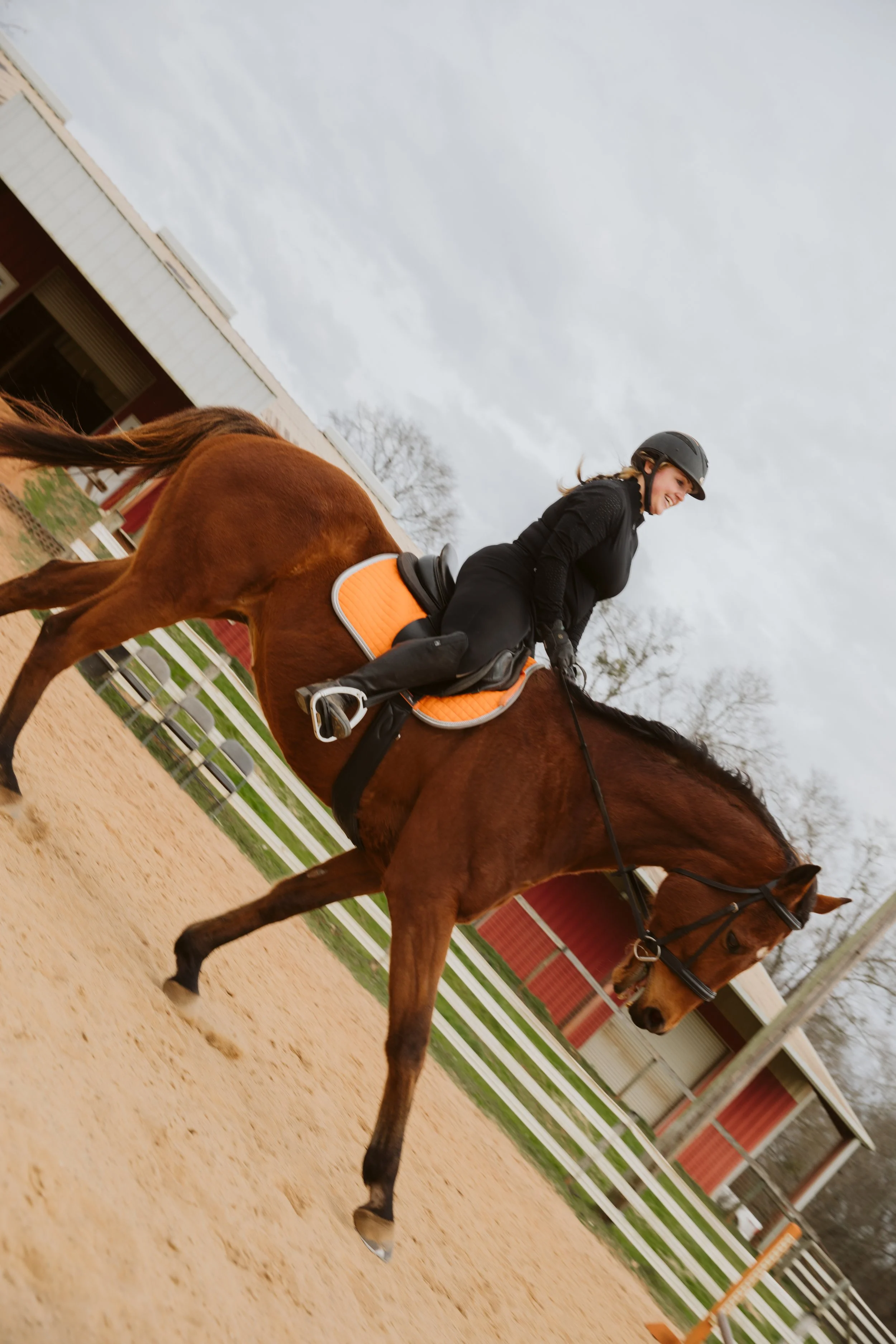 Rider Jumping in Arena