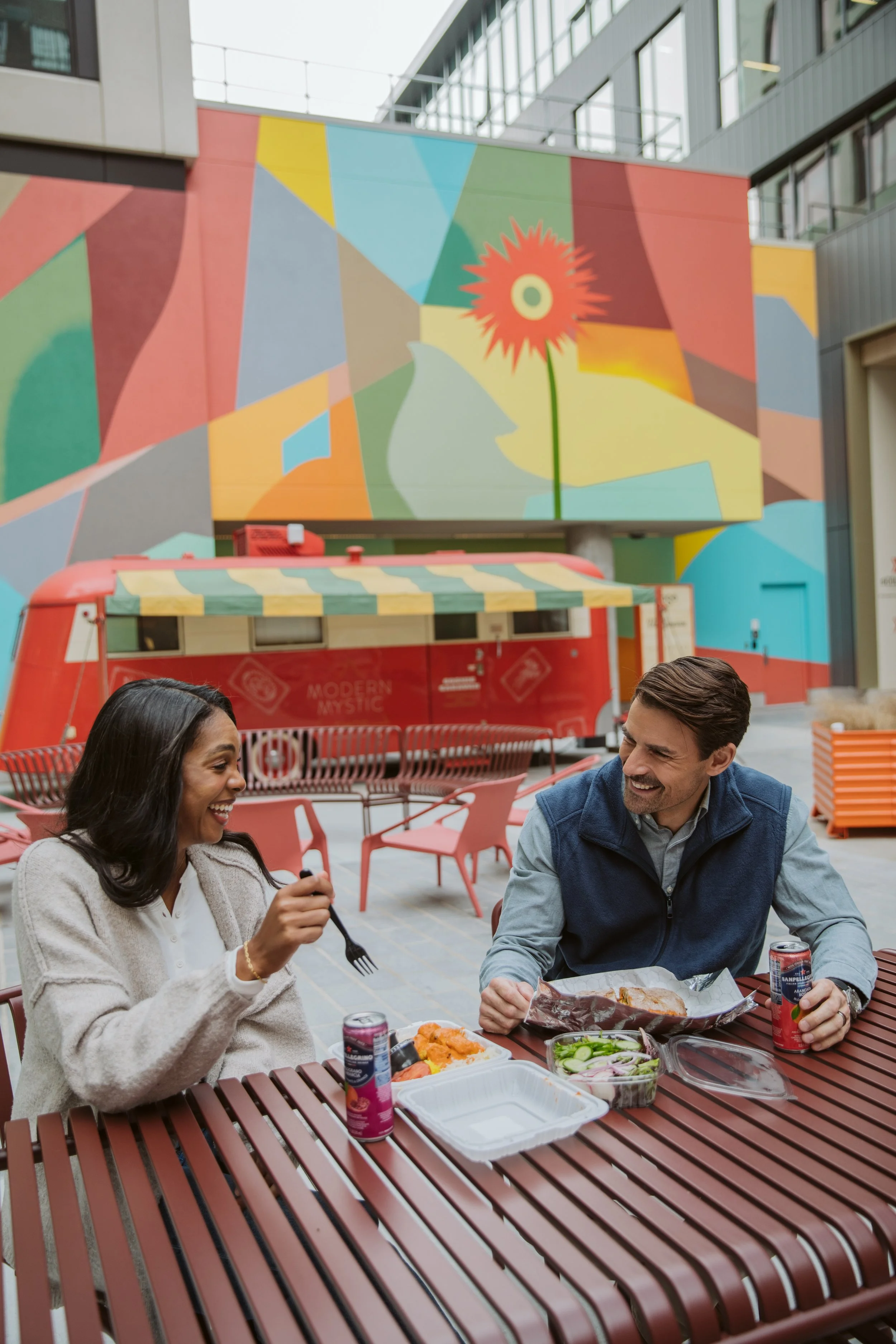 Couple having lunch outdoors at Atlanta Beltline patio seating