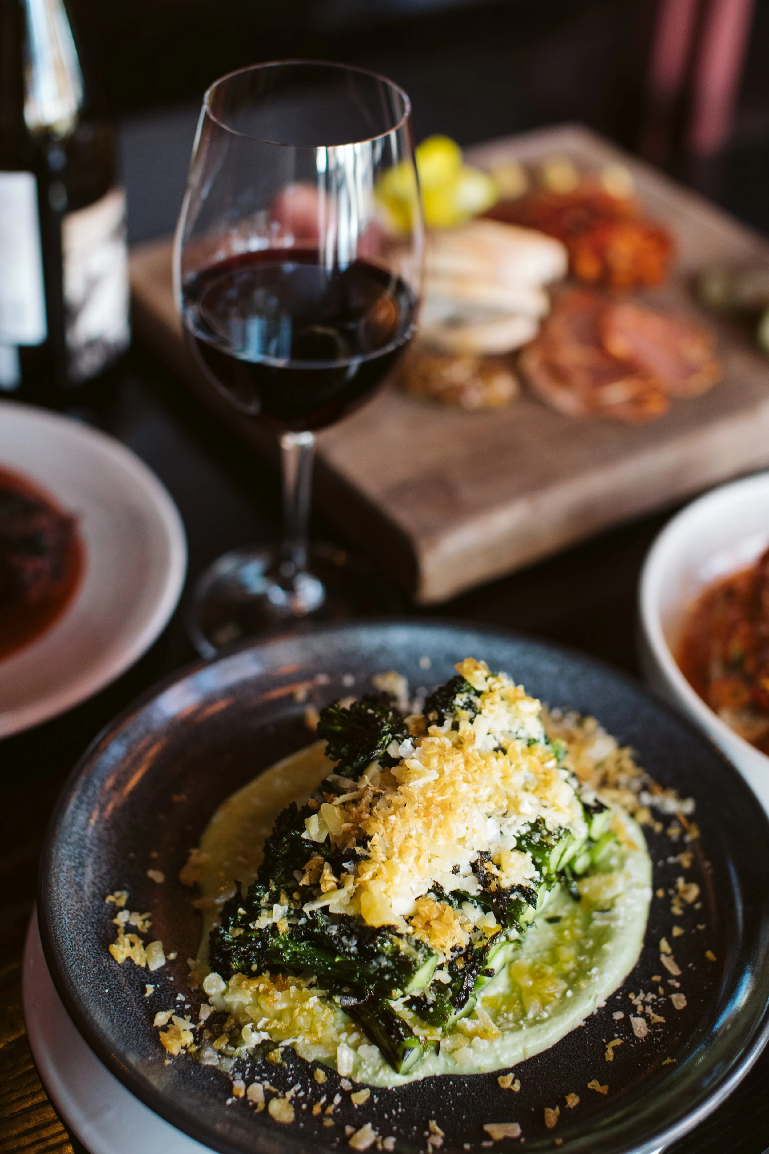 Elegant restaurant meal with wine and plated dish
