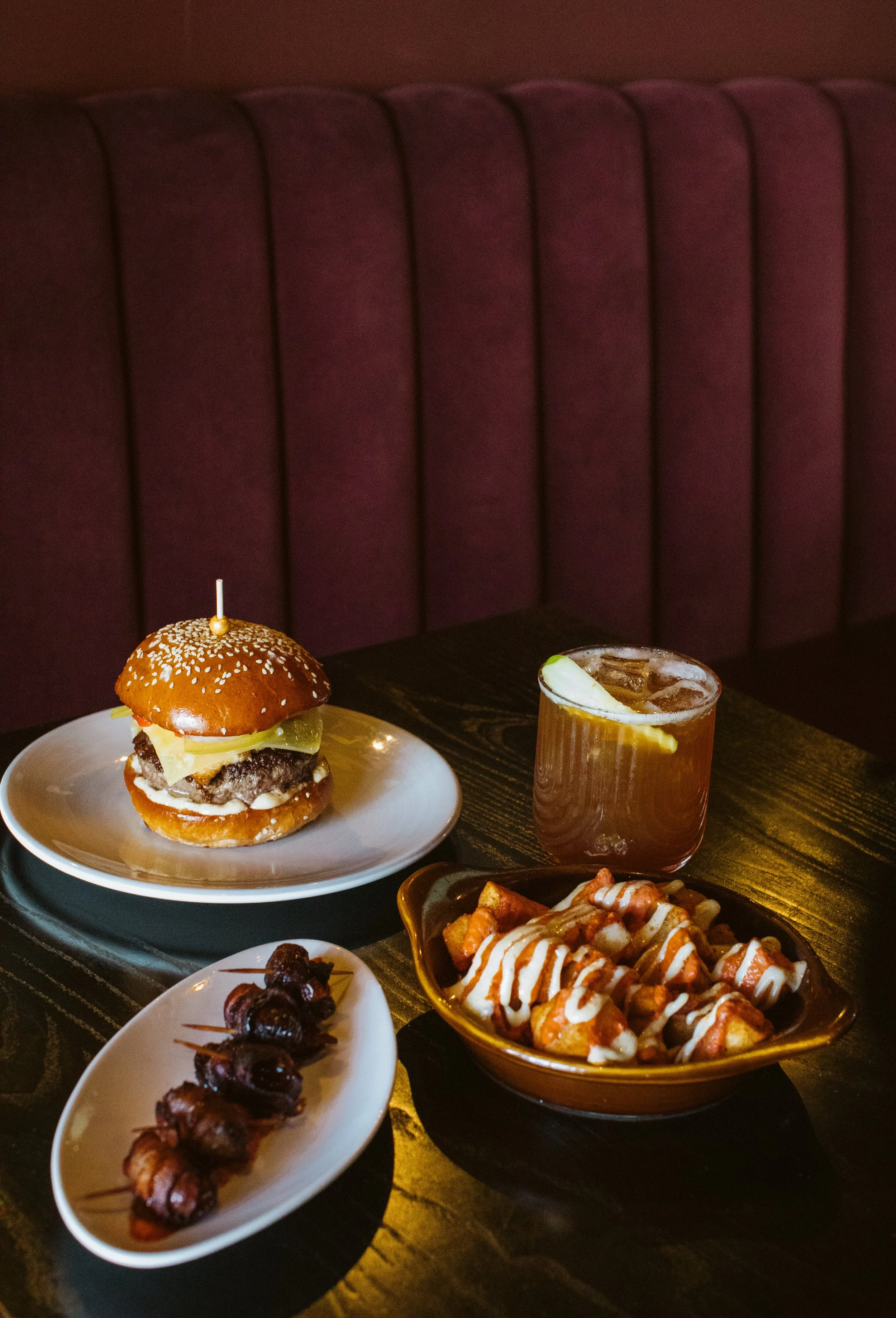 Restaurant appetizers and cocktails on dining table