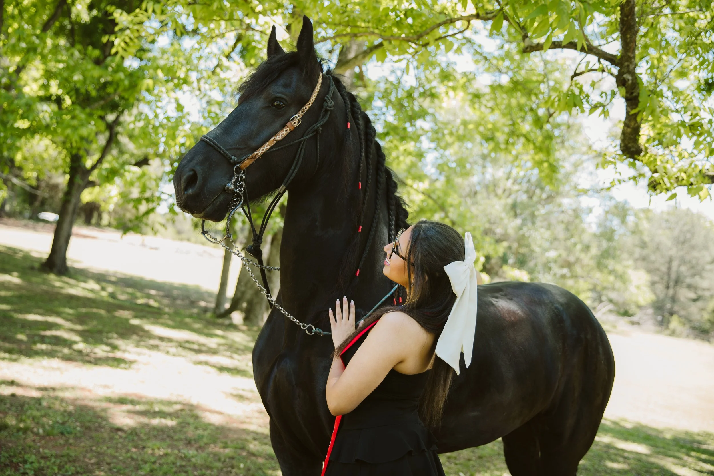 Outdoor graduation portraits with horse