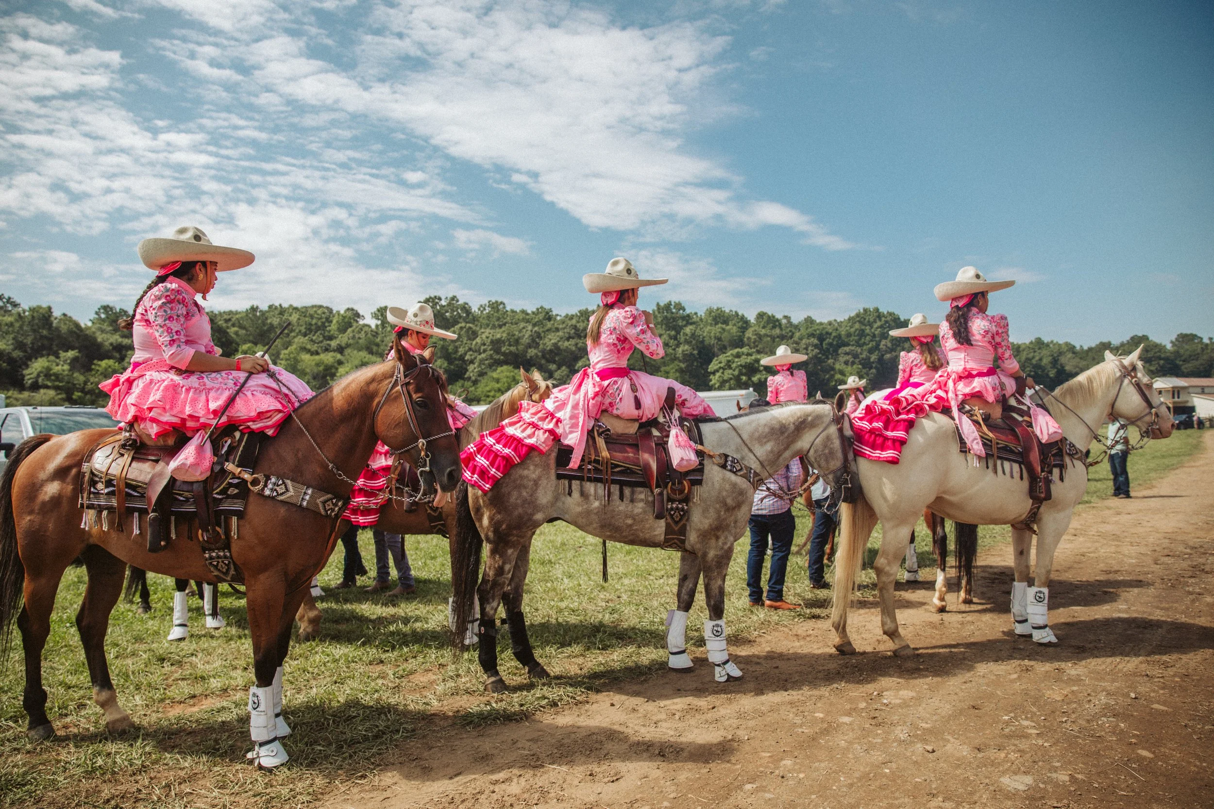 Escaramuza riders lined up on horseback