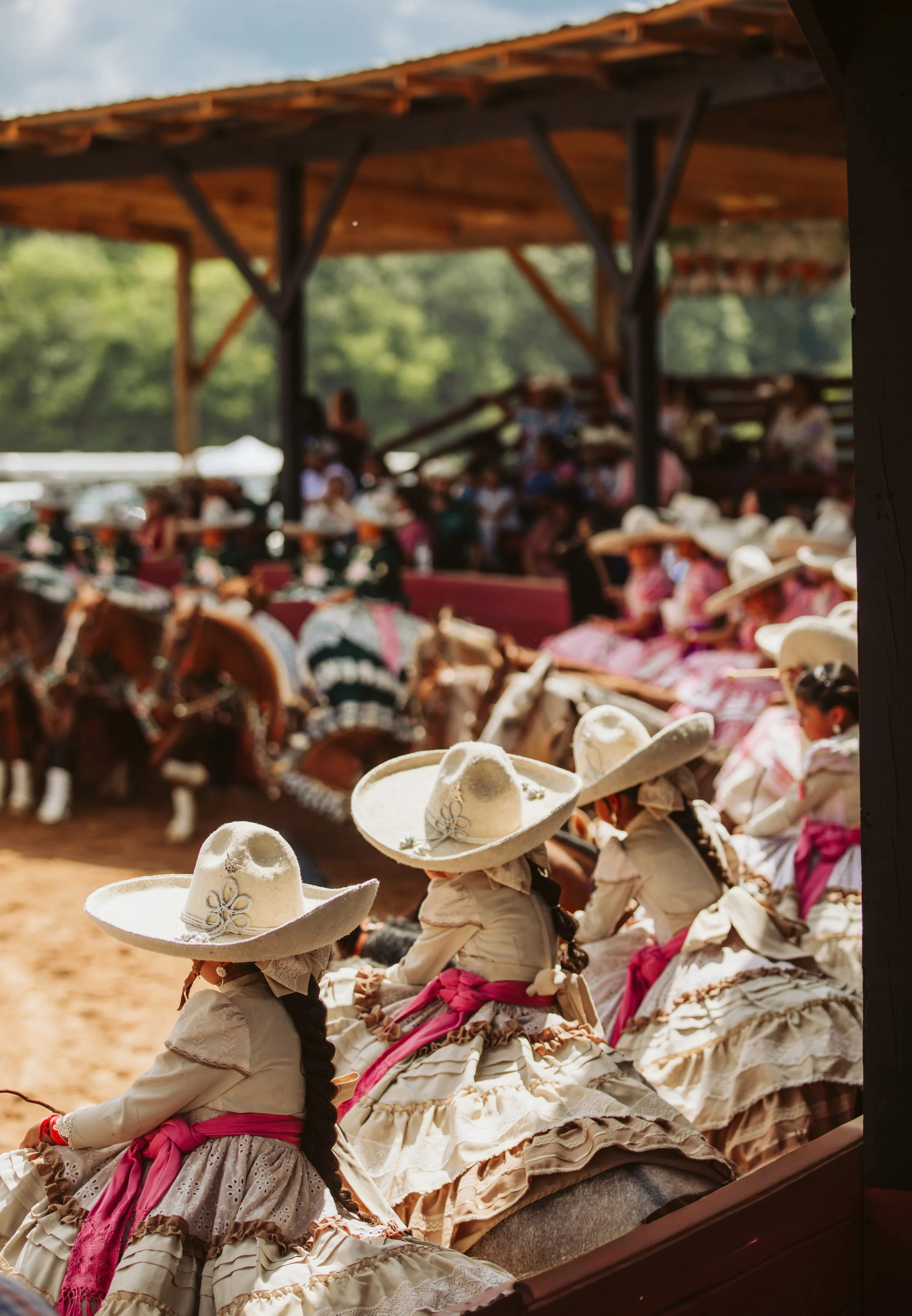 Escaramuza riders watching from grandstand