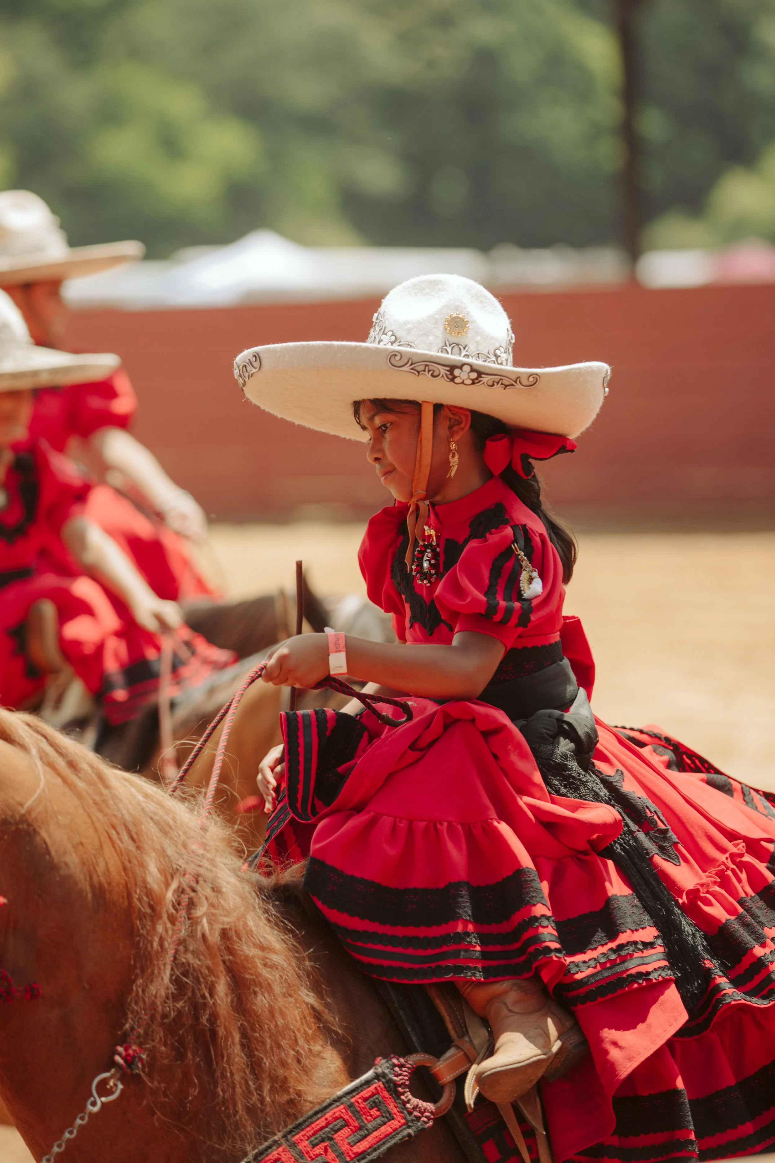 Charra rider in traditional red dress