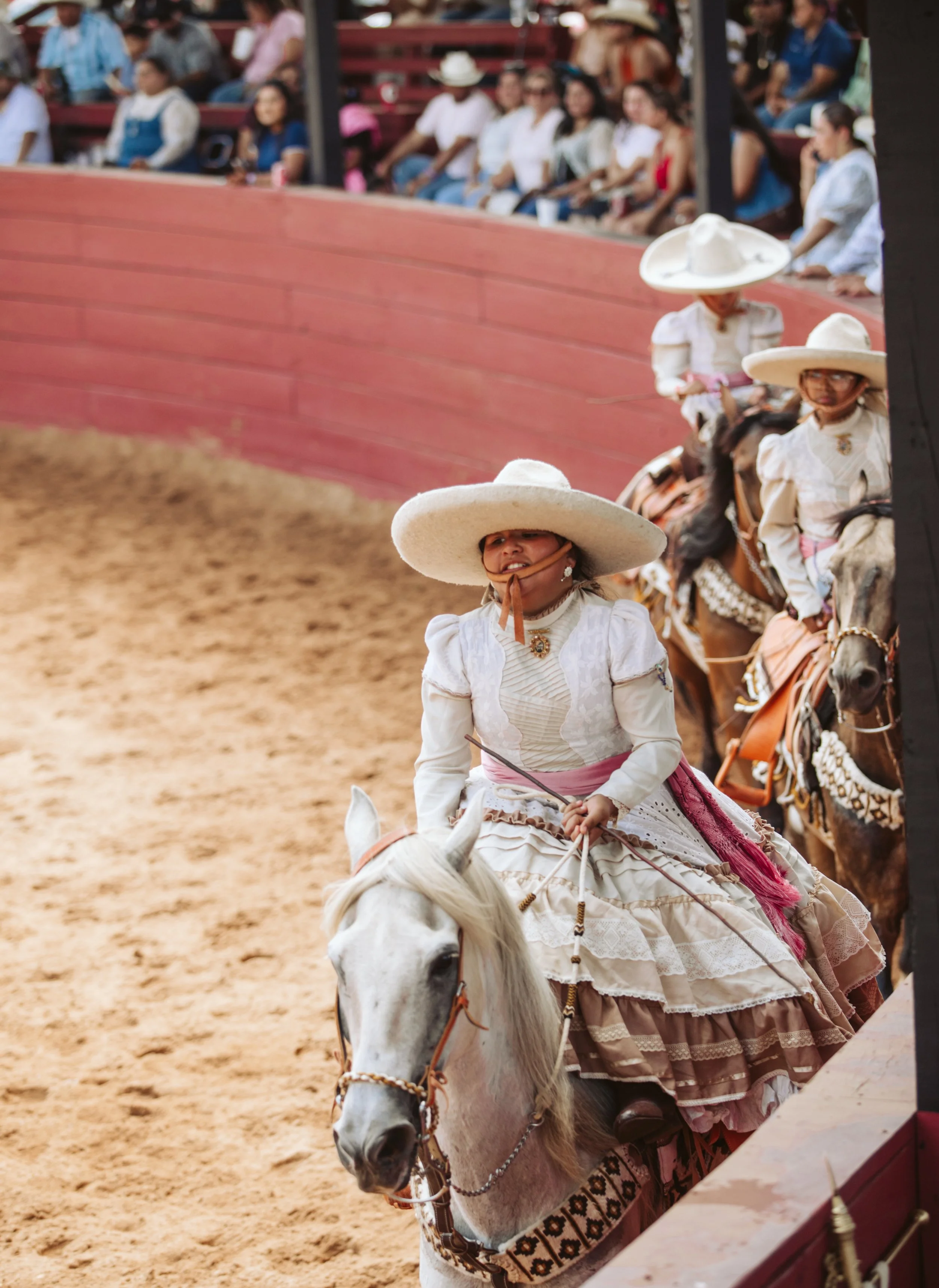 Escaramuza riders entering arena