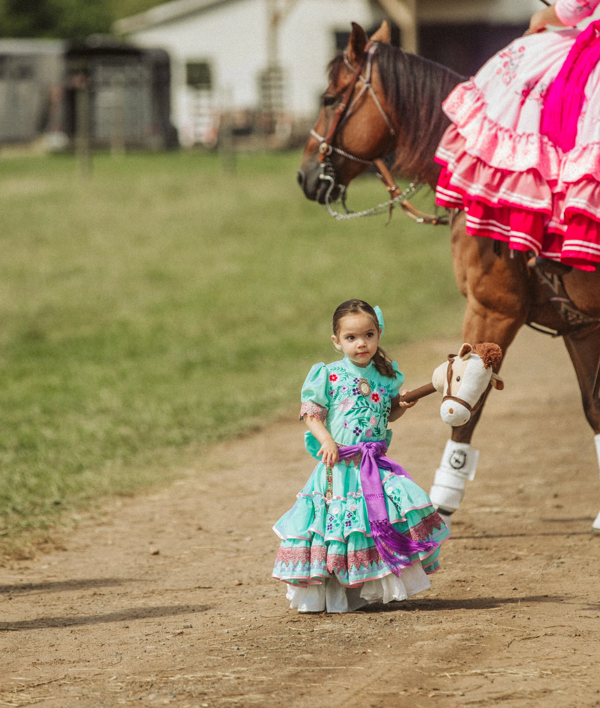 Young girl beside charra horse