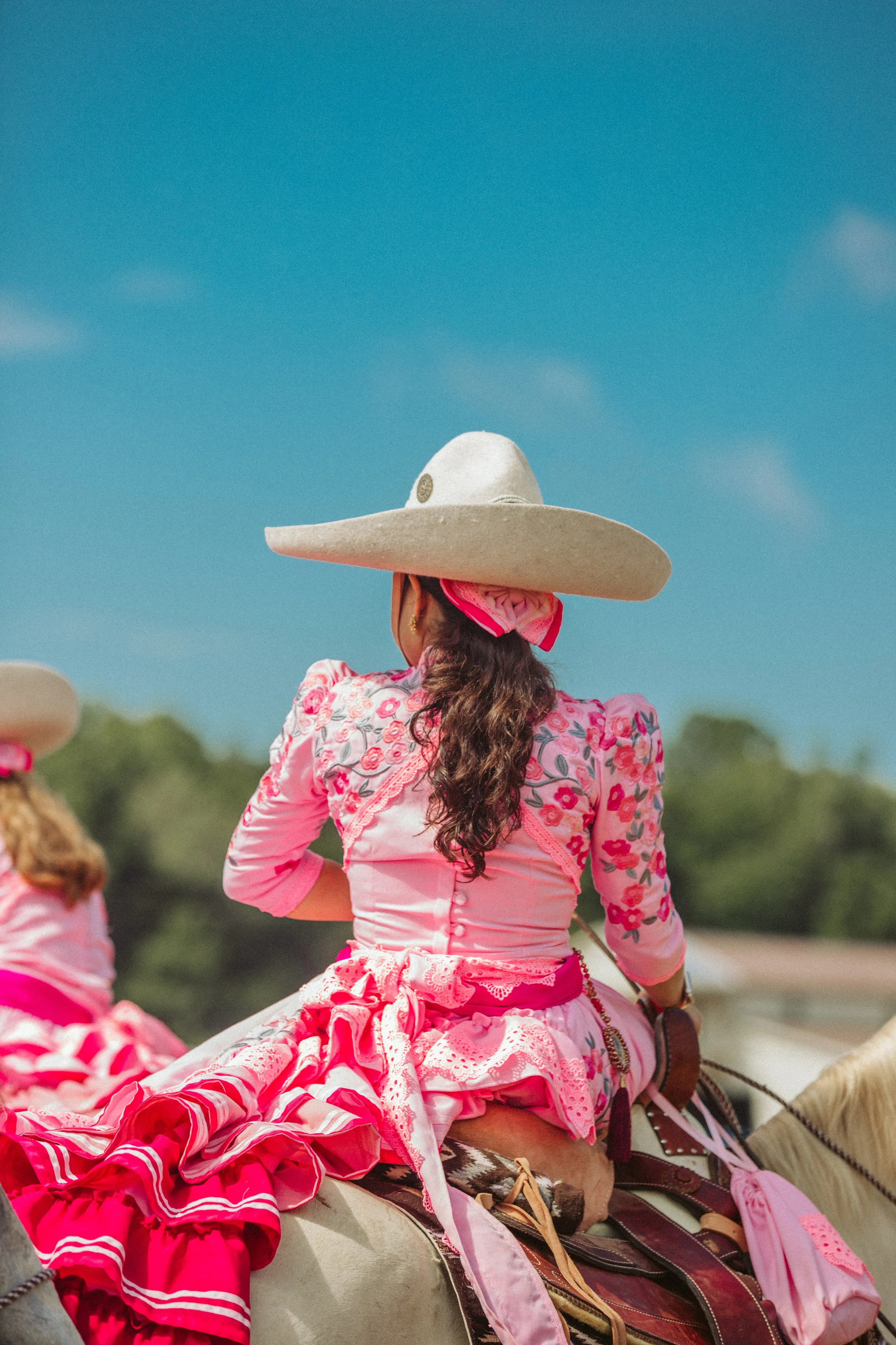Escaramuza rider from behind