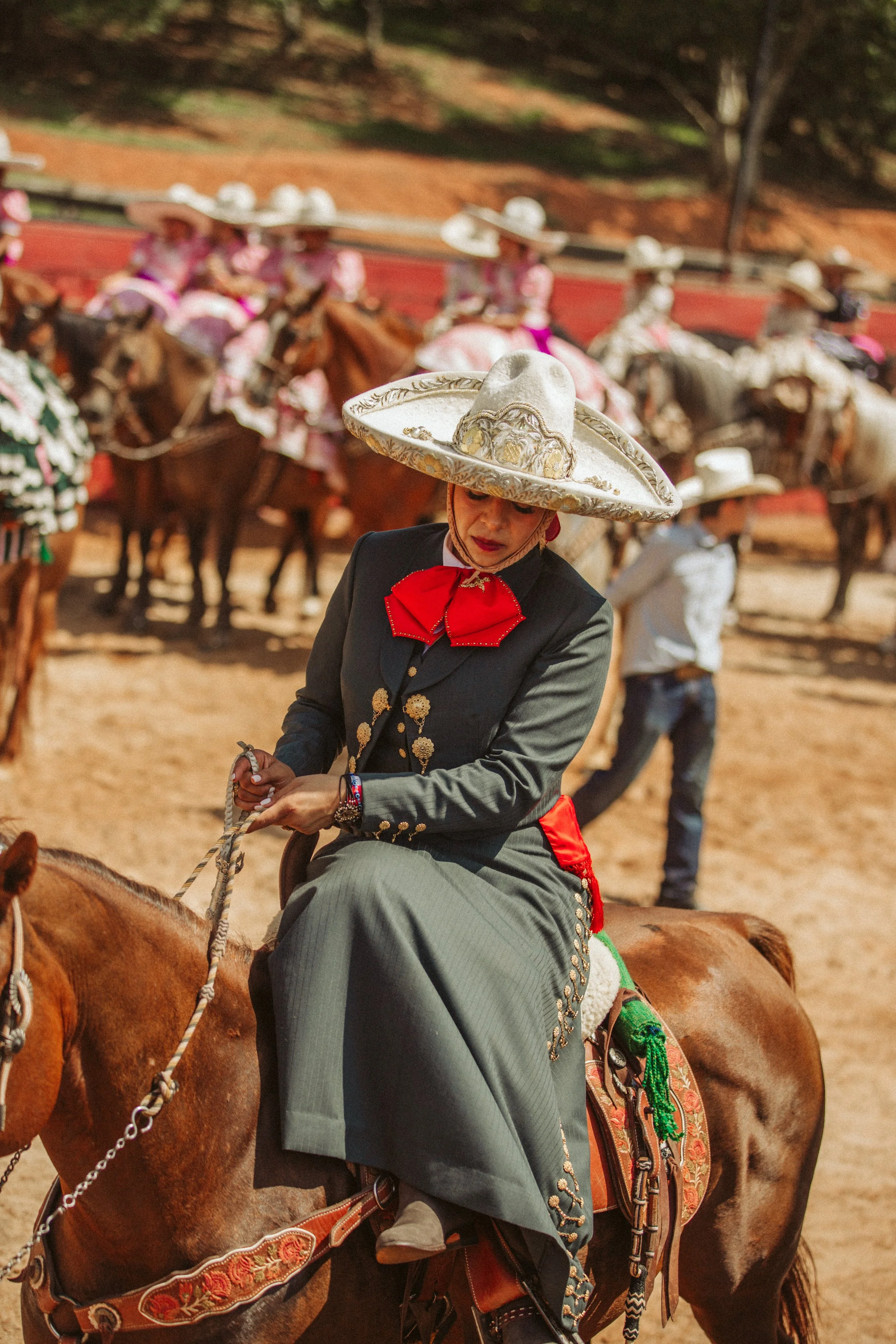 Escaramuza rider in gray outfit
