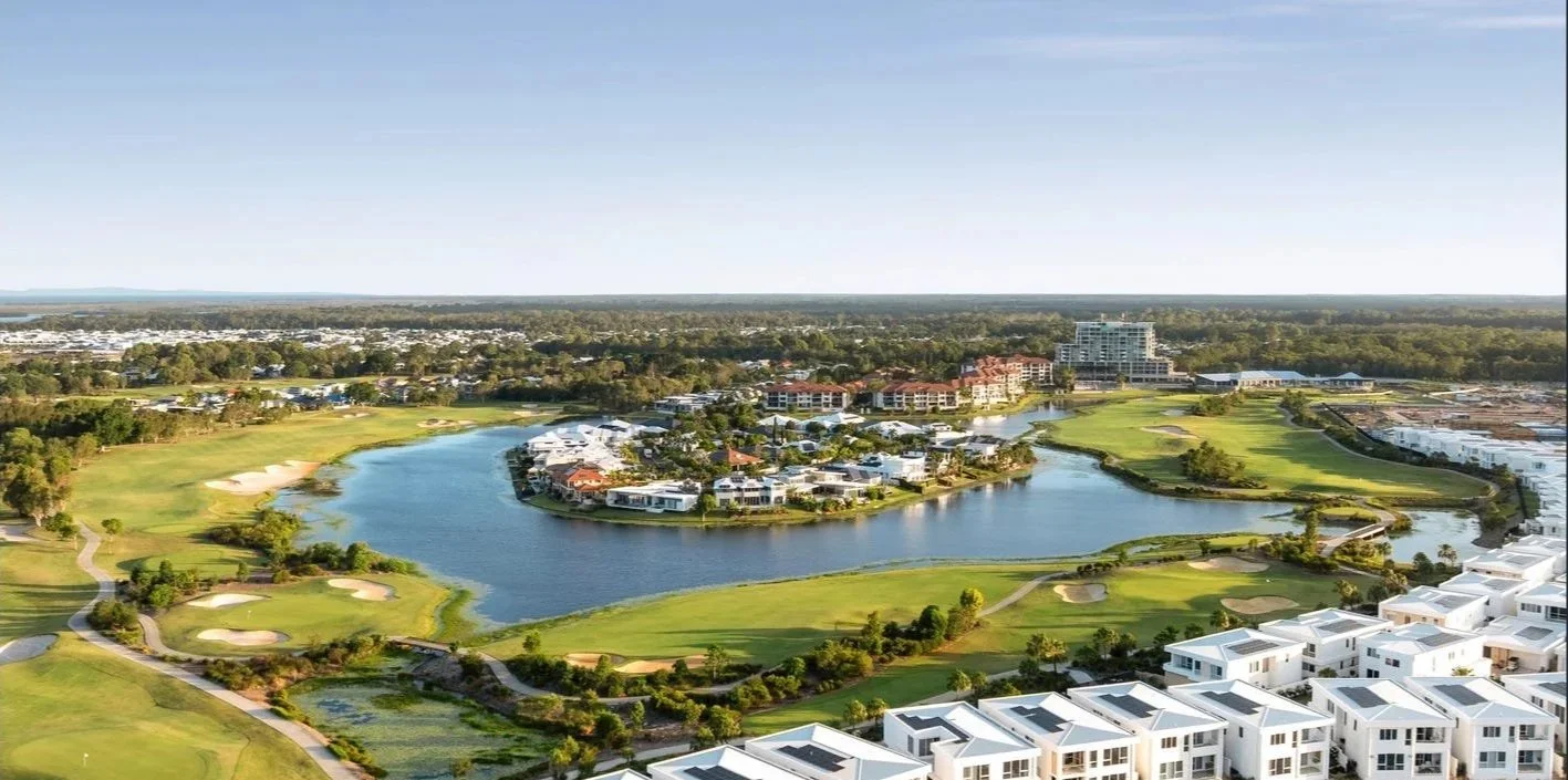 Aerial view of a Southeast Queensland land lease community with homes set around a lake