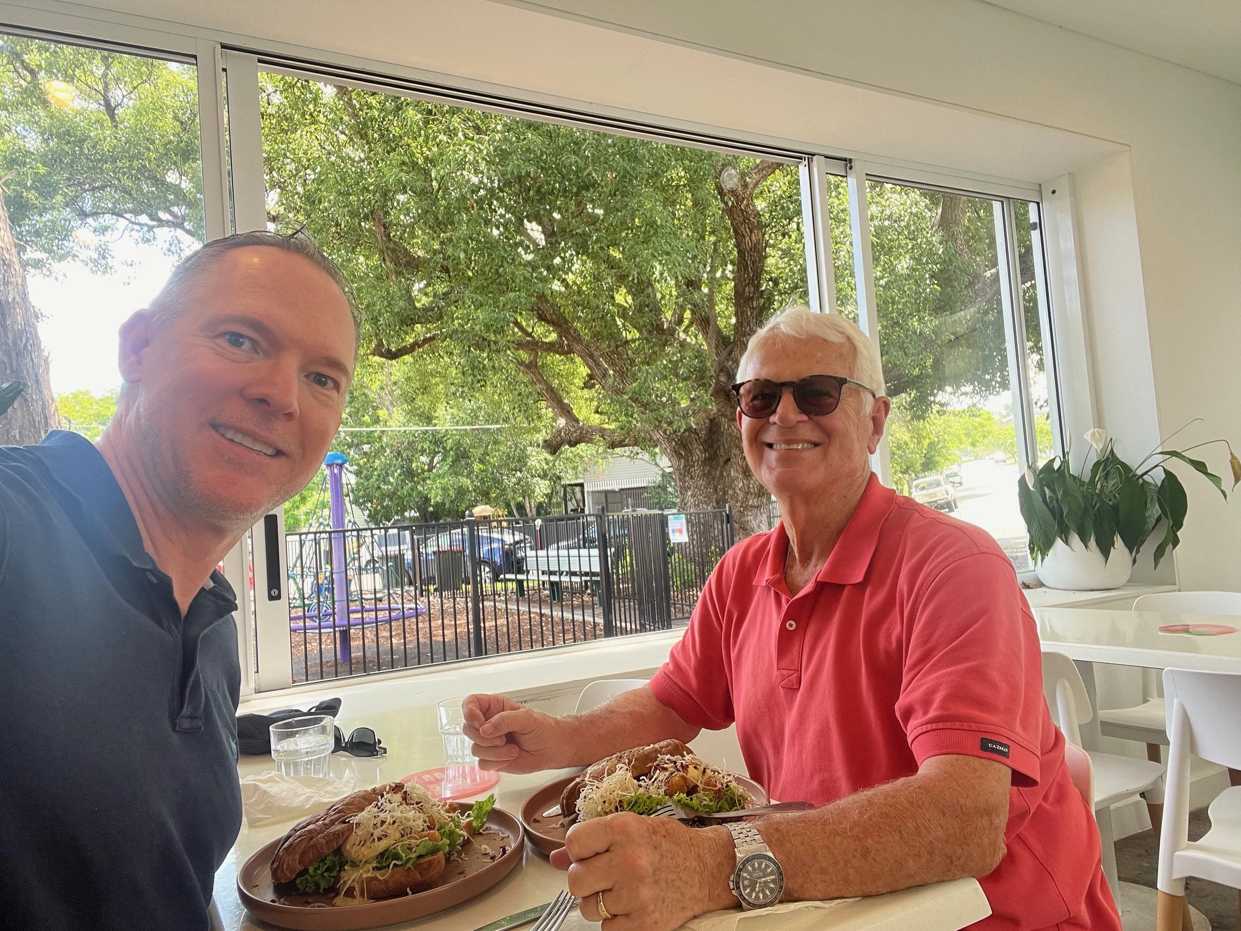 Sam Price and his father enjoying lunch together.