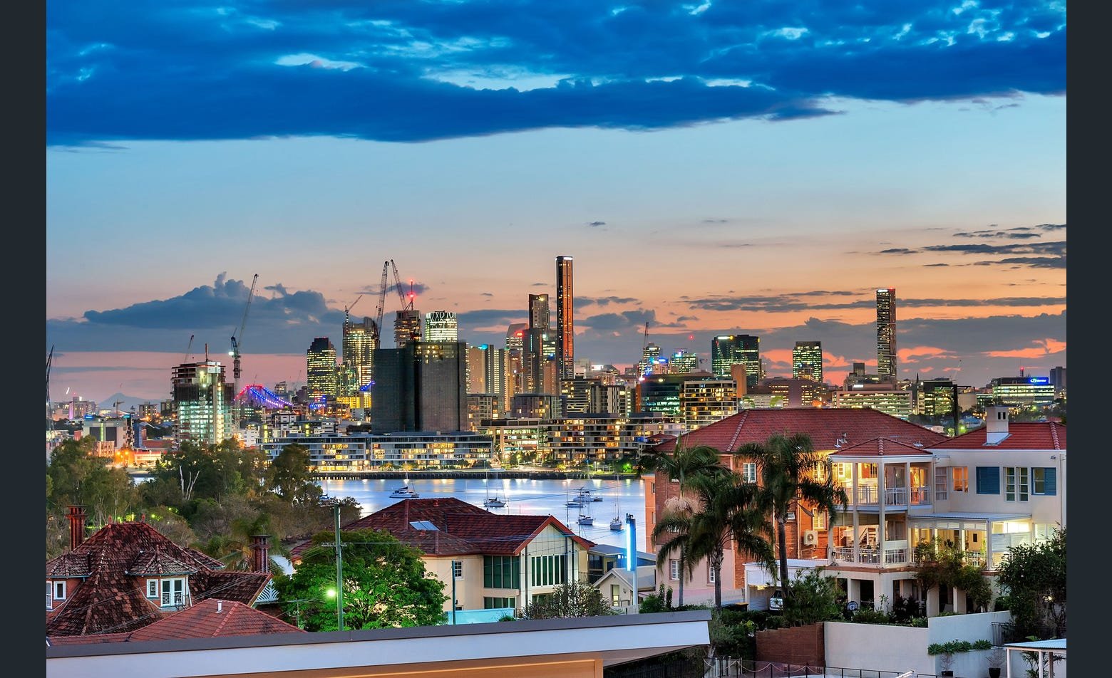 Photo of Brisbane CBD on dusk taken from a retirement village.