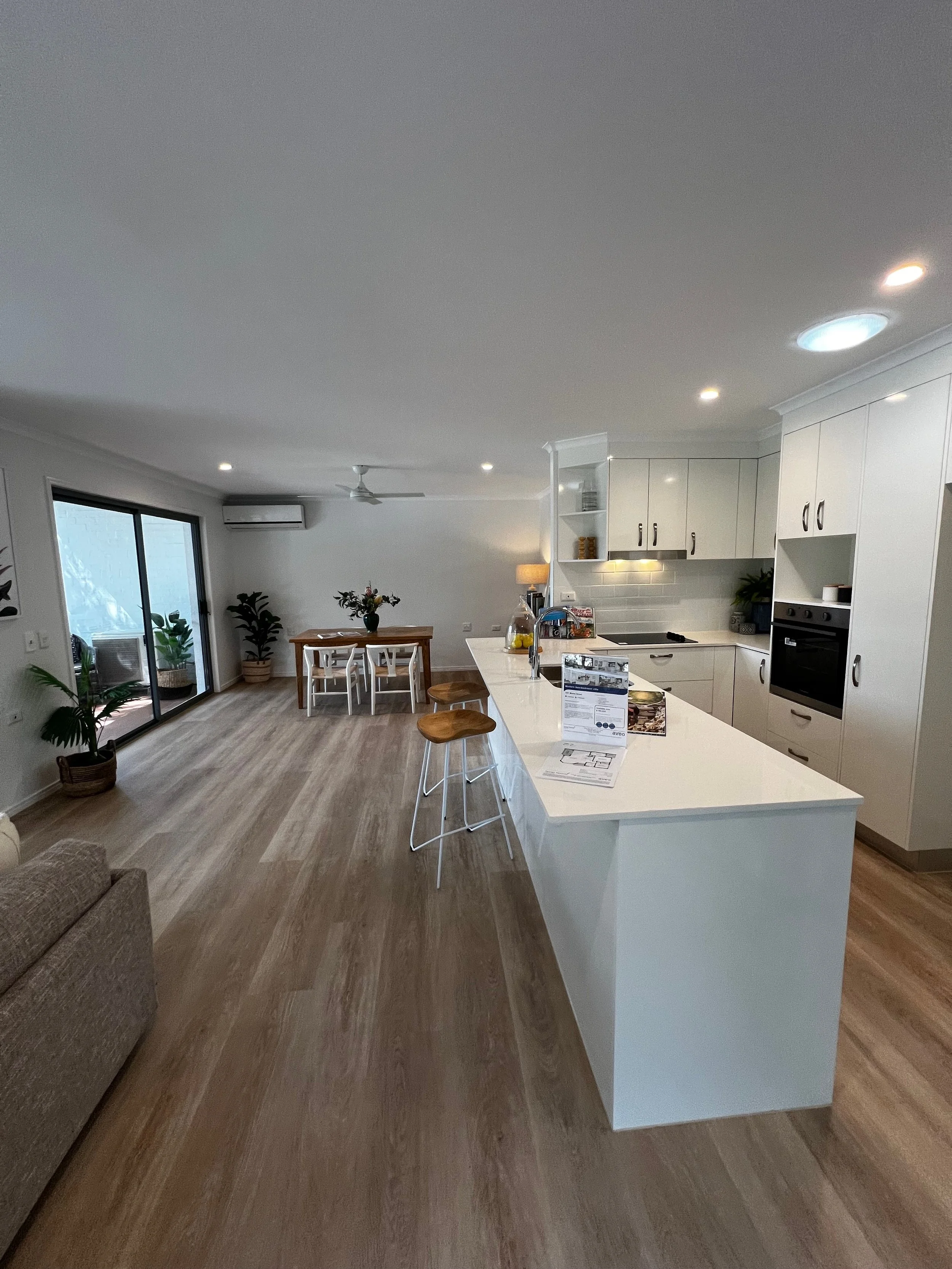 Kitchen and living room of a Brisbane retirement village unit for sale