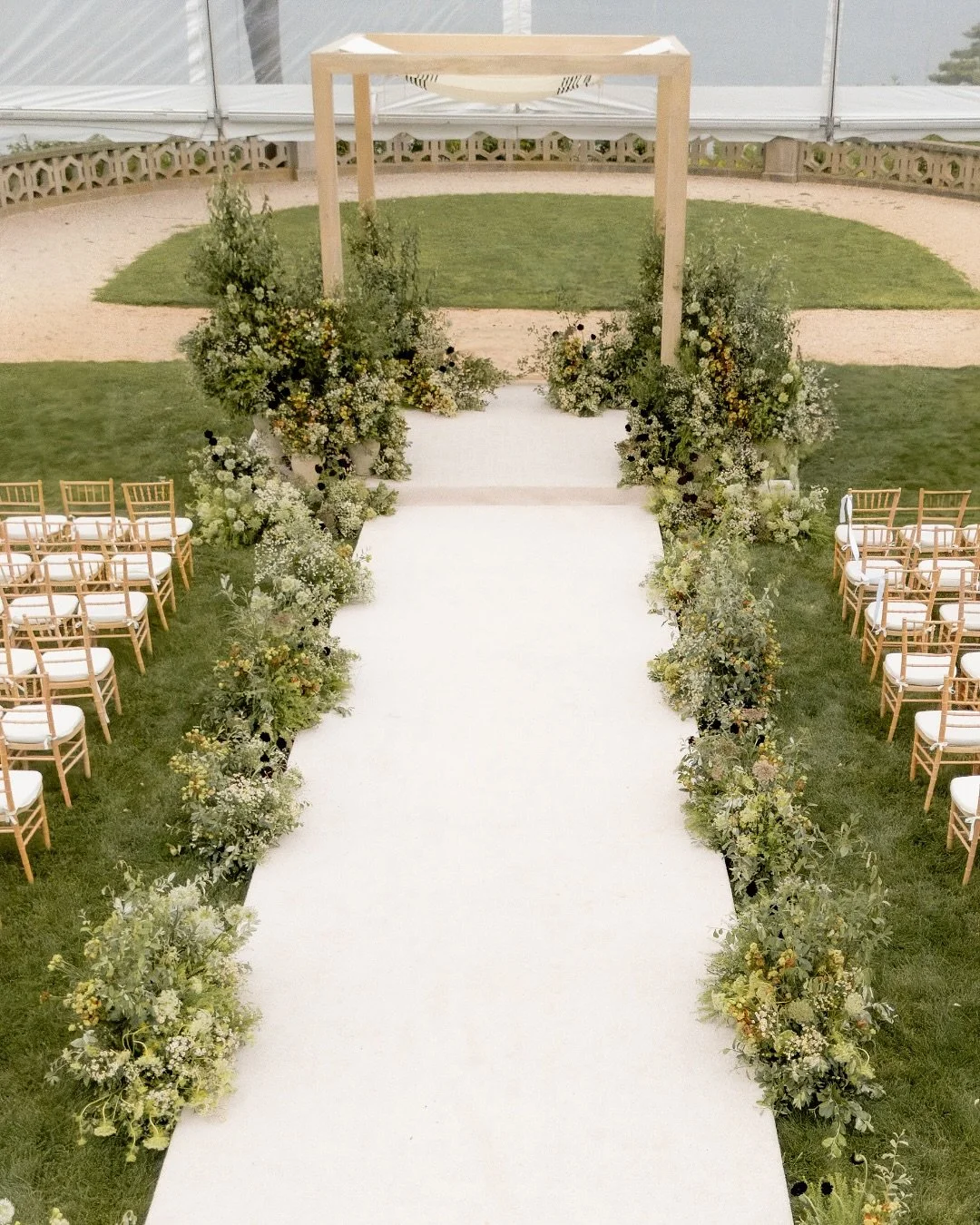 The wedding ceremony unfolded on the lawn of Hempstead House, the Gold Coast&rsquo;s own castle. Mai and Ben&rsquo;s celebration was ethereal and dreamy, set beneath a minimalist chuppah surrounded by blooming gardens.

Planning: @biancabinc
Floral D