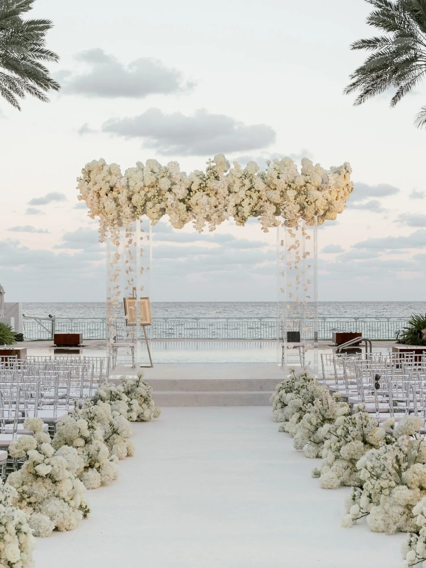 Orchids, waves, then vows. A day that needed no rain plan. They said you can&rsquo;t have it all&hellip; this one said you can 🤍

Planner: @carriezackevents
Event Design, Florals, Fabrications &amp; Production: @cerkacreative
Venue:&nbsp;@eaupalmbea