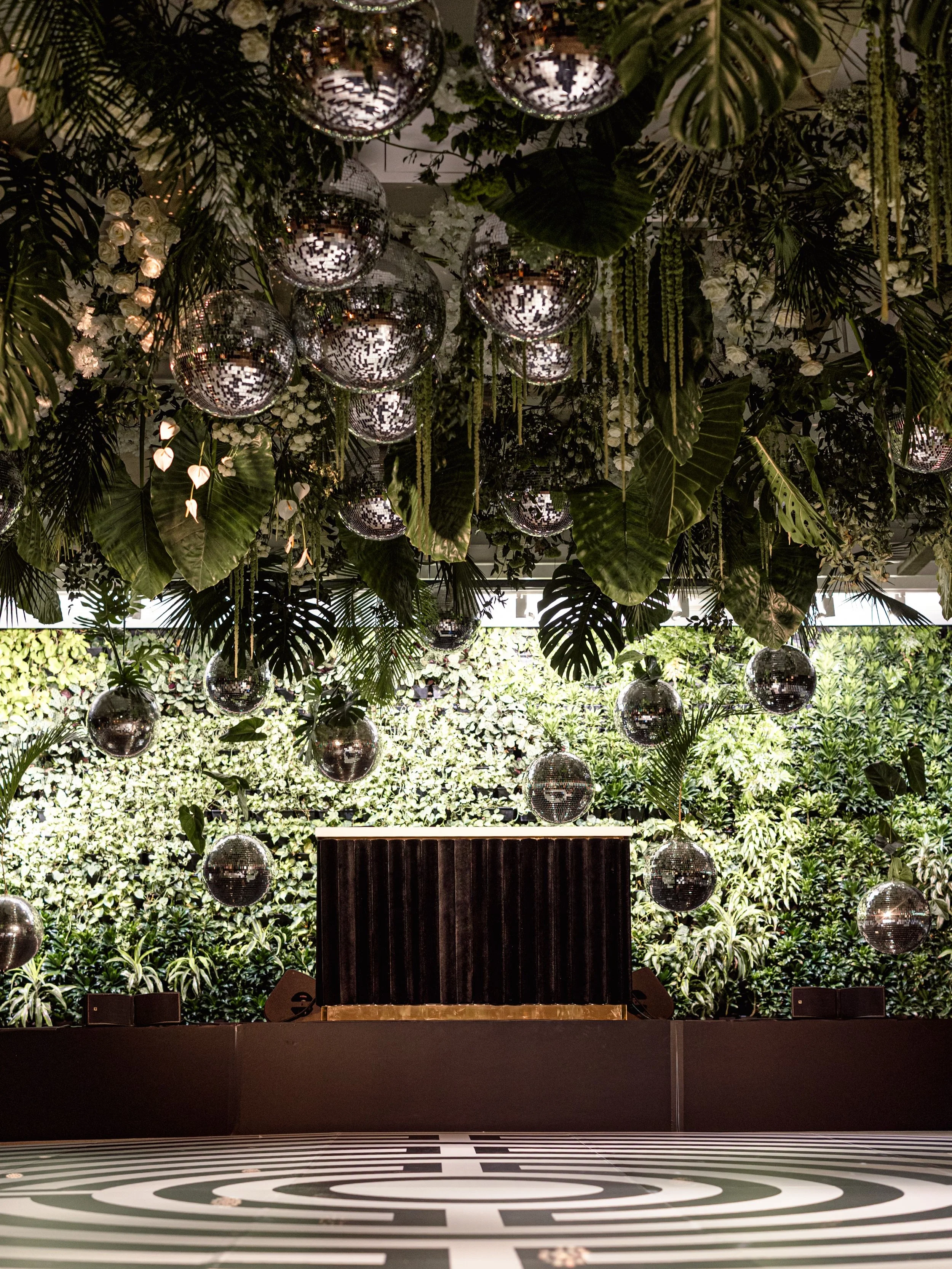 A night for wild romantics. 🐆🪩🌴

For Jaime and Brandon&rsquo;s reception, an atmosphere of after-dark allure transported guests into a decadent tropical dreamscape. Lush foliage, monstera leaves, and cascading blooms were layered against graphic b