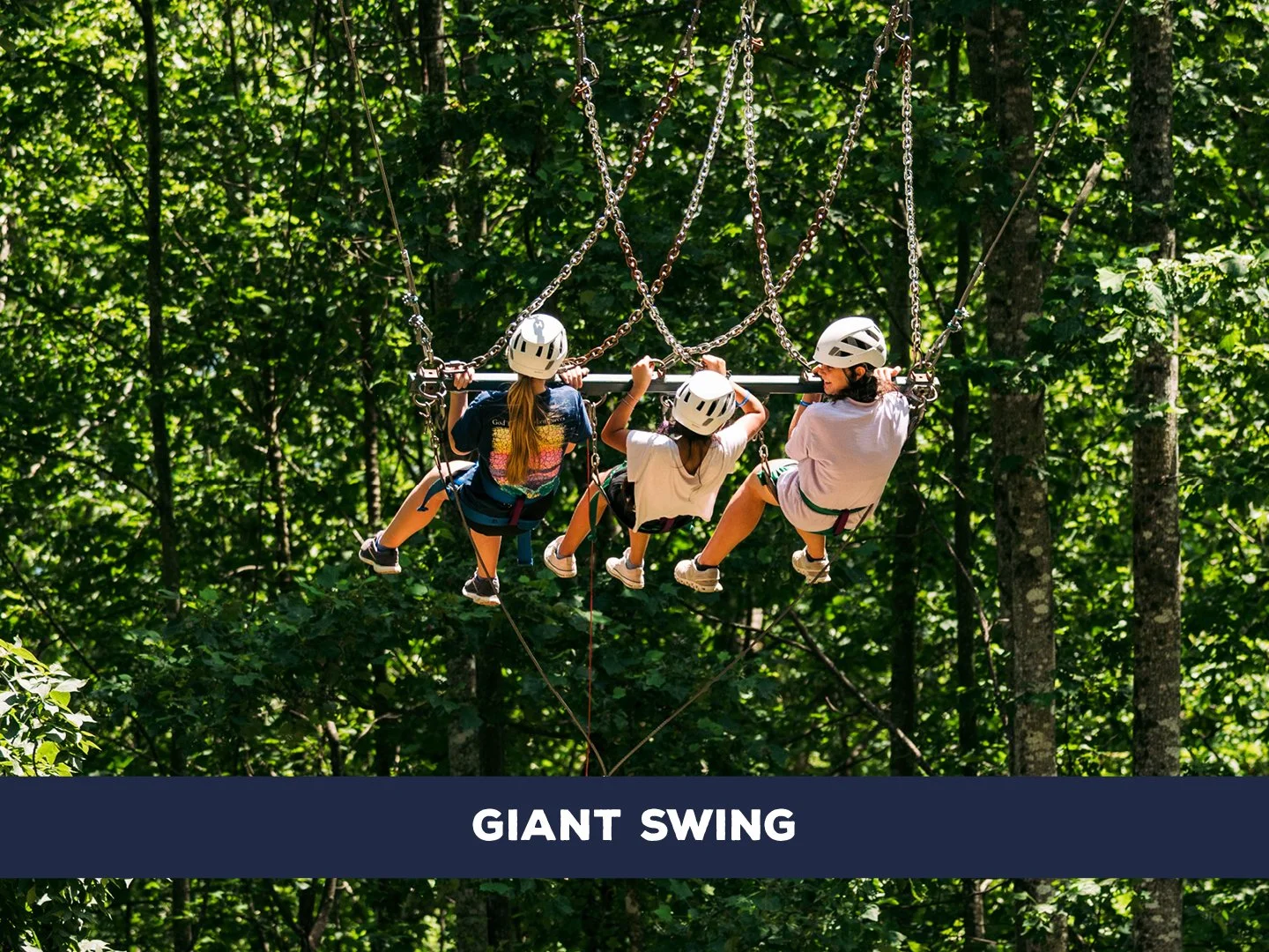 A group of three is lifted high and released into a massive swing ride controlled by one participant.