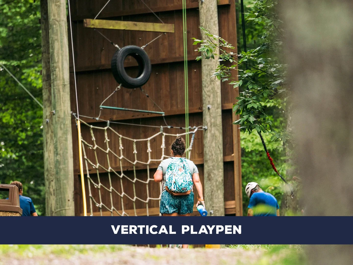 Scale challenging obstacles like rope walls and hanging tires on the tower while secured to a belayer.