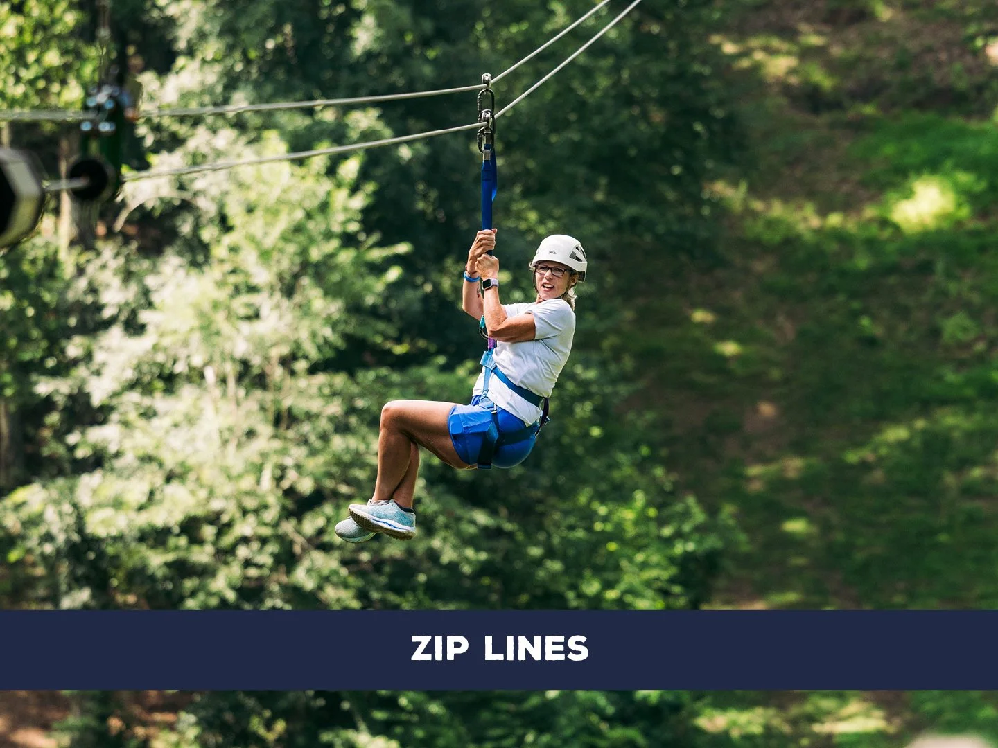Ride one of two 800-foot zip lines at high speed while soaring above camp with scenic mountain views. Conquer your fears and race your friends!