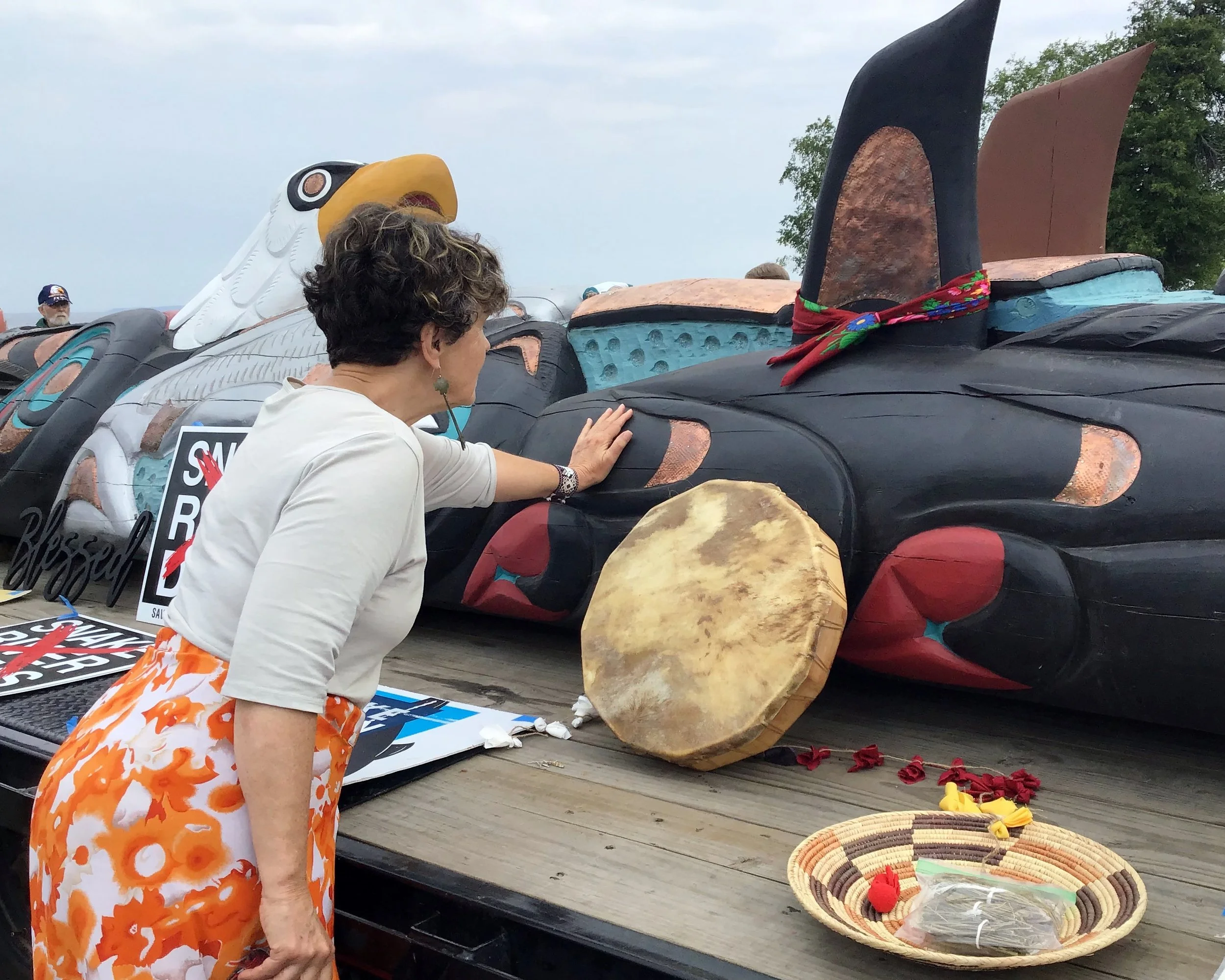 The Red Road to D.C. - Deb adds her blessing to the totem pole at the Straits of Mackinac. 
