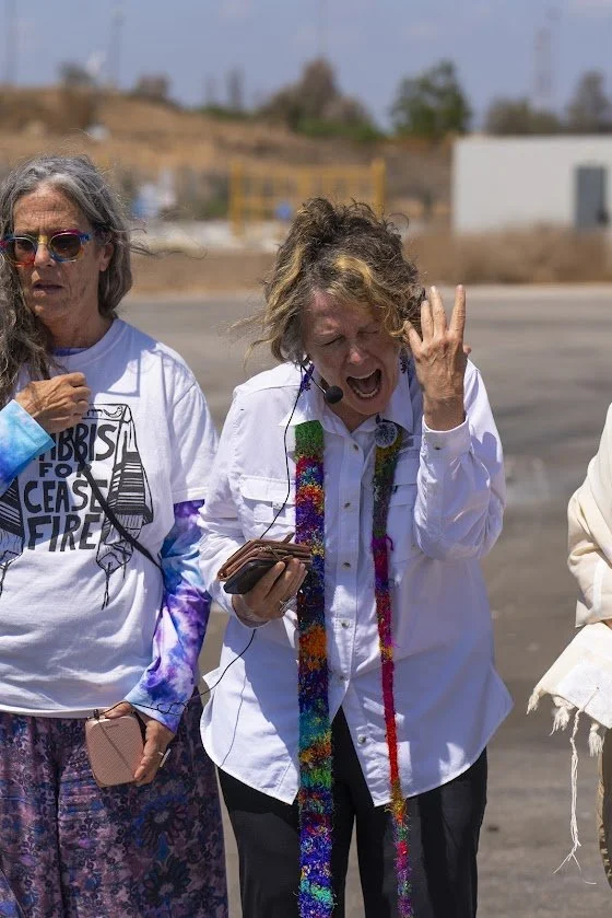 Deb leading lament in a prayer circle at the
Kerem Shalom border crossing into Gaza.