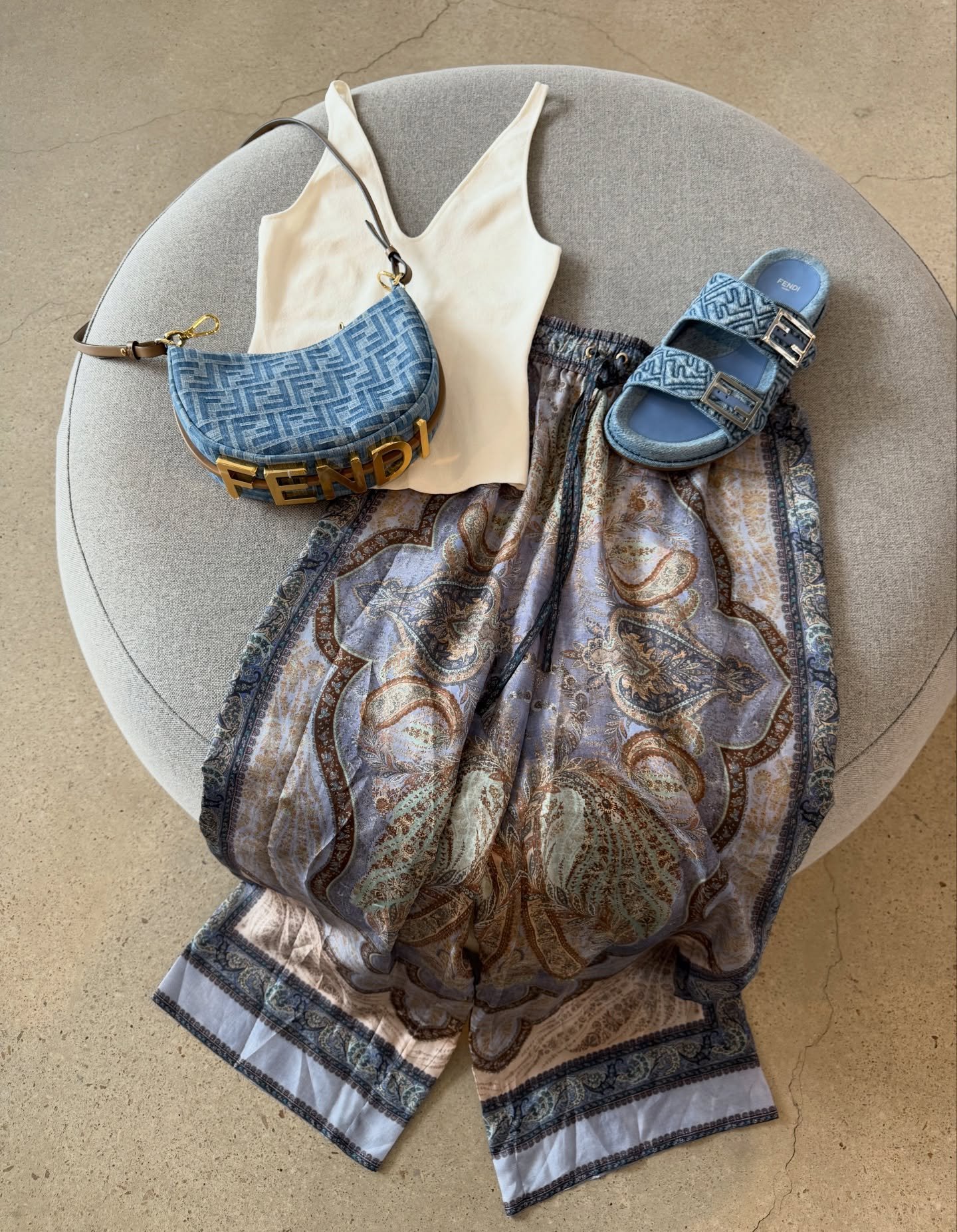 Your weekend lineup is here! 🥰

Image 1:
Scanlan Theodore white crepe tank - size S - $50
Zimmerman patterned pants - size 0 - $235
Fendi slides - size 40 - $850
Fendi mini hobo - $2,500

Image 2:
Zimmerman black tank - size 1 - $80
Witchery white m
