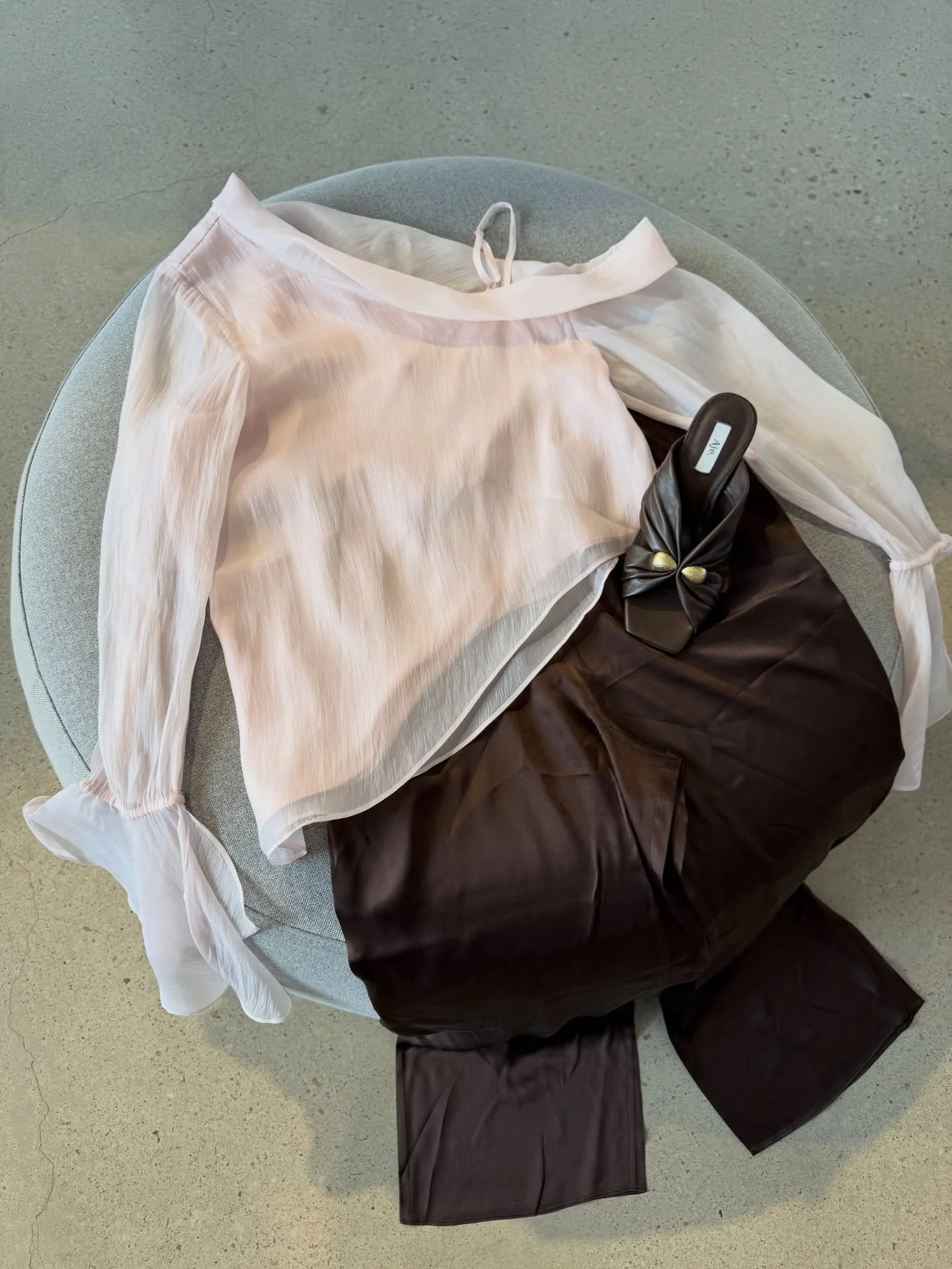 A little flat lay moment 🫶🏼

Image 1:
Aje pink top - size 10 - $100
Sire brown silk pants - size 3 - $95
Aje choc heel - size 37 - $200

Image 2: Rebecca Vallance black and white set - size M - $295
Gucci horse bit heels - size 38 - $900

Image 3: 