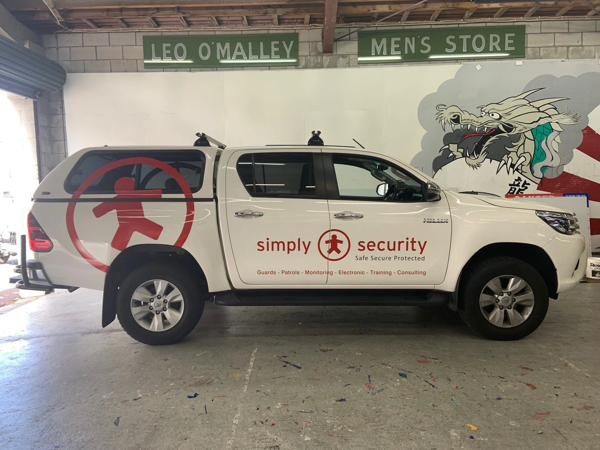 Simply Sercurity Toyota HiLux ute signage.jpg