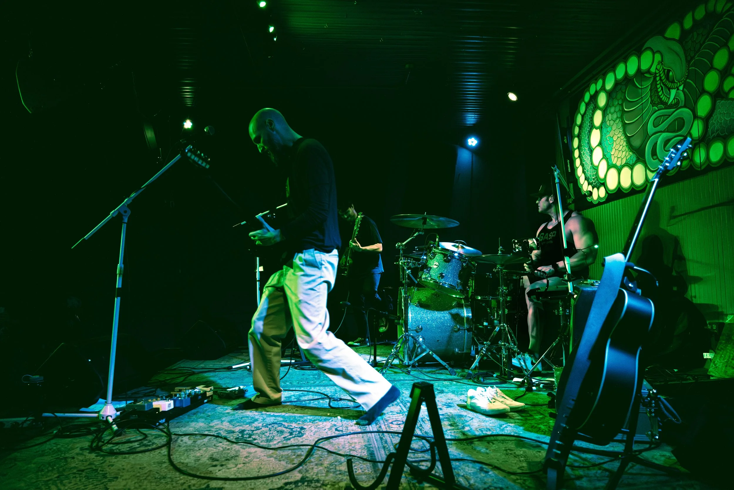 Really Bad performing live at the Cobra in East Nashville under green stage lighting.