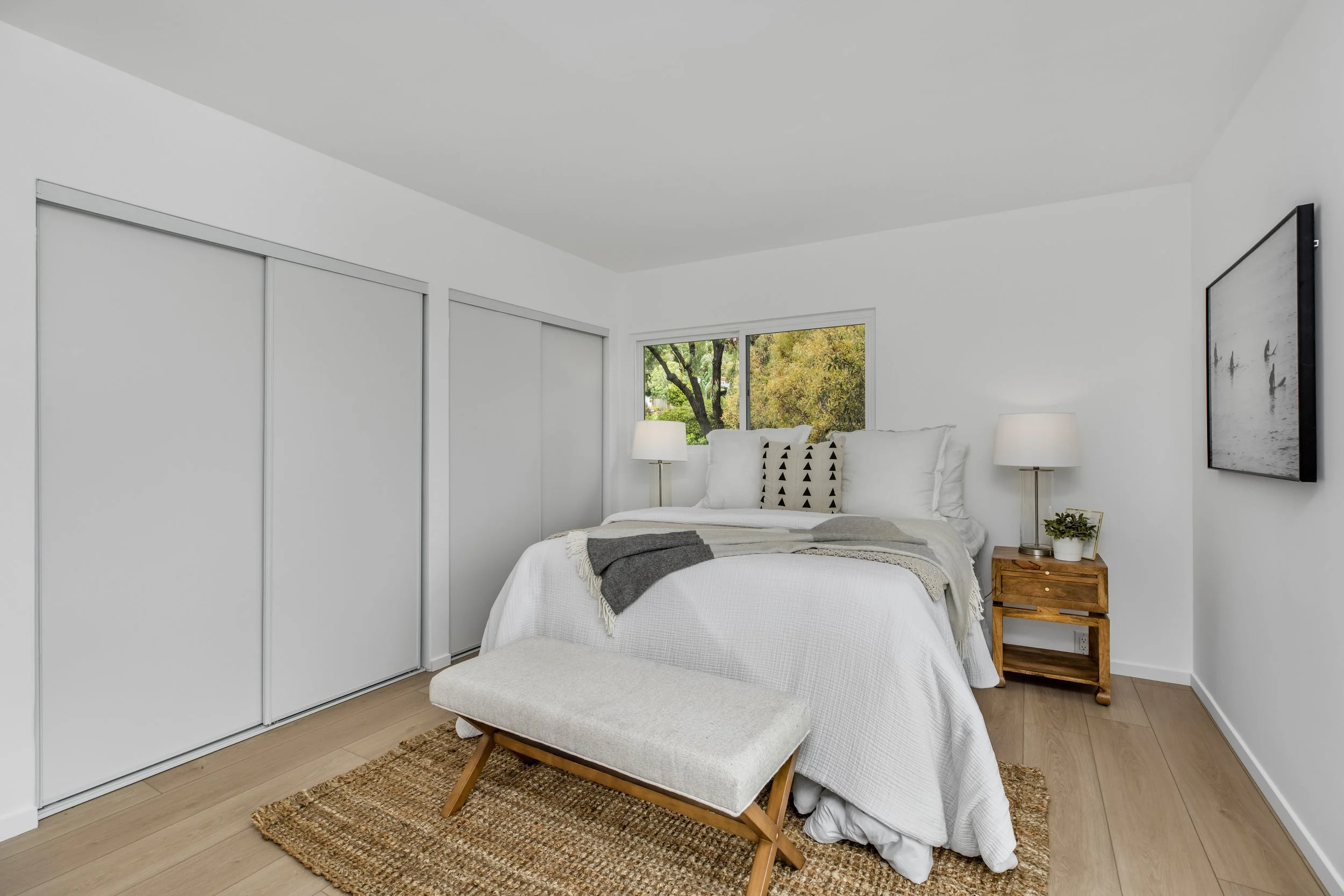Additional guest bedroom downstairs with sweeping ocean and canyon views