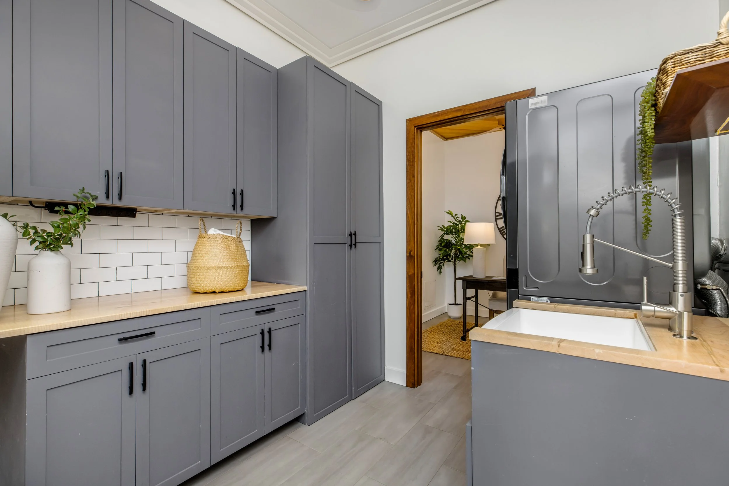 Remodeled Laundry Room adjacent to the office, which is not included in the bedroom count.