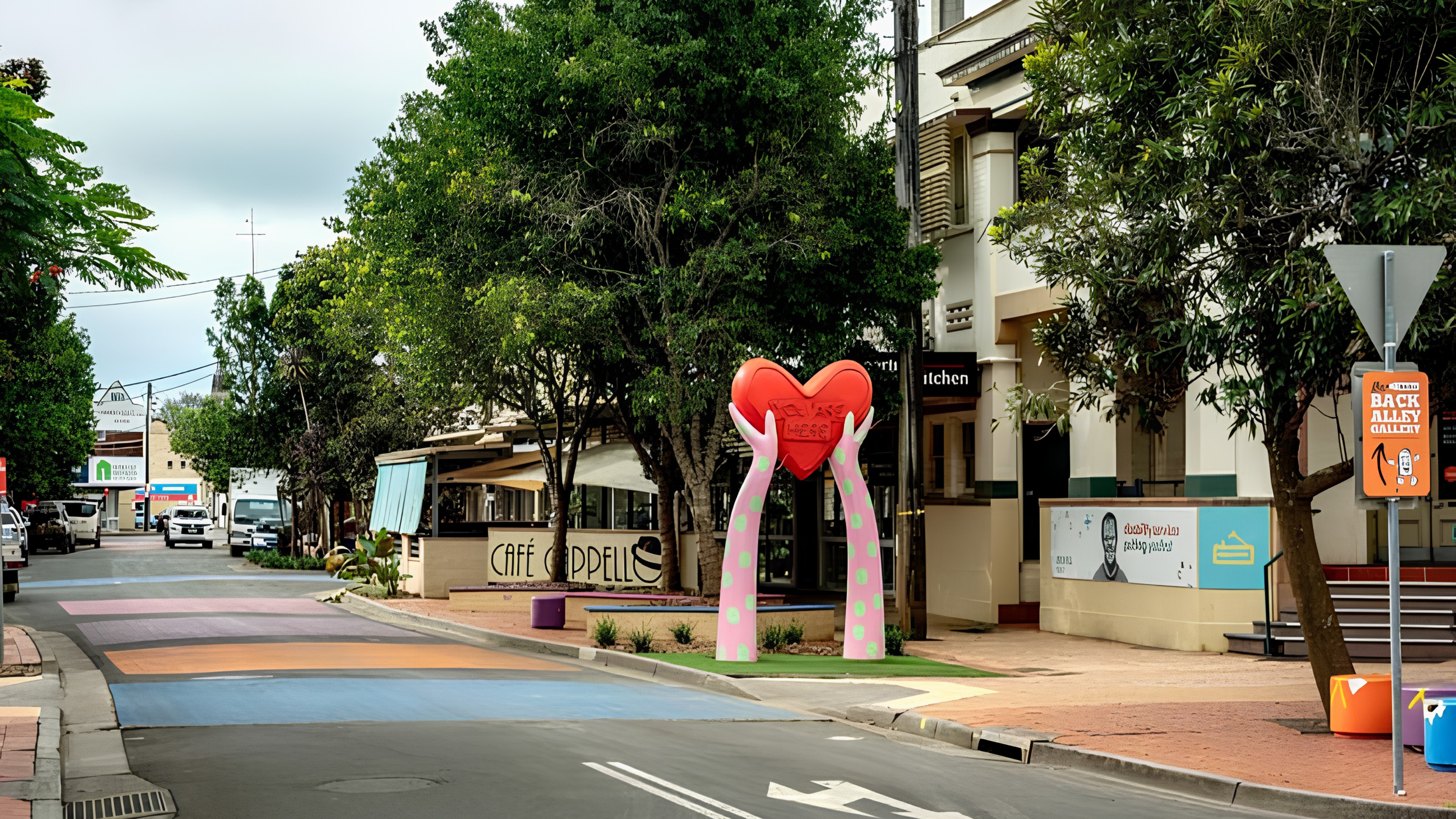 Lismore NSW street scene featuring the Love Here sculpture, an Oke Building service area