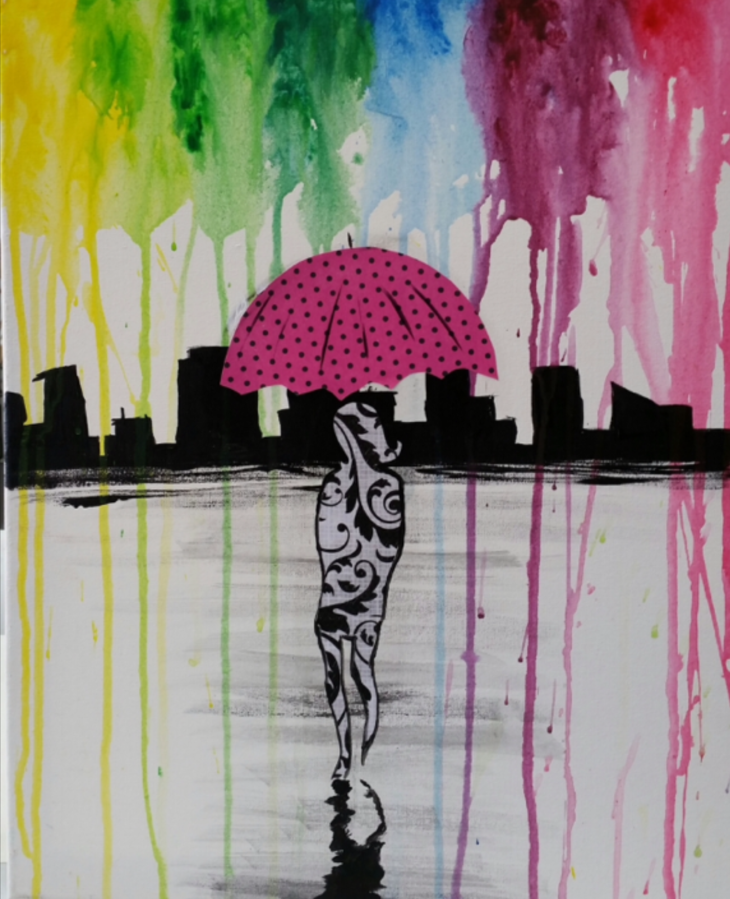A stylized black and white silhouette of a woman holding a pink umbrella with black polka dots. The background consists of colorful watercolor rain streaks in green, yellow, blue, purple, and pink, with black silhouettes of city buildings along a wat