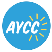 AYCC logo with white text on a blue circular background and yellow sunburst design.