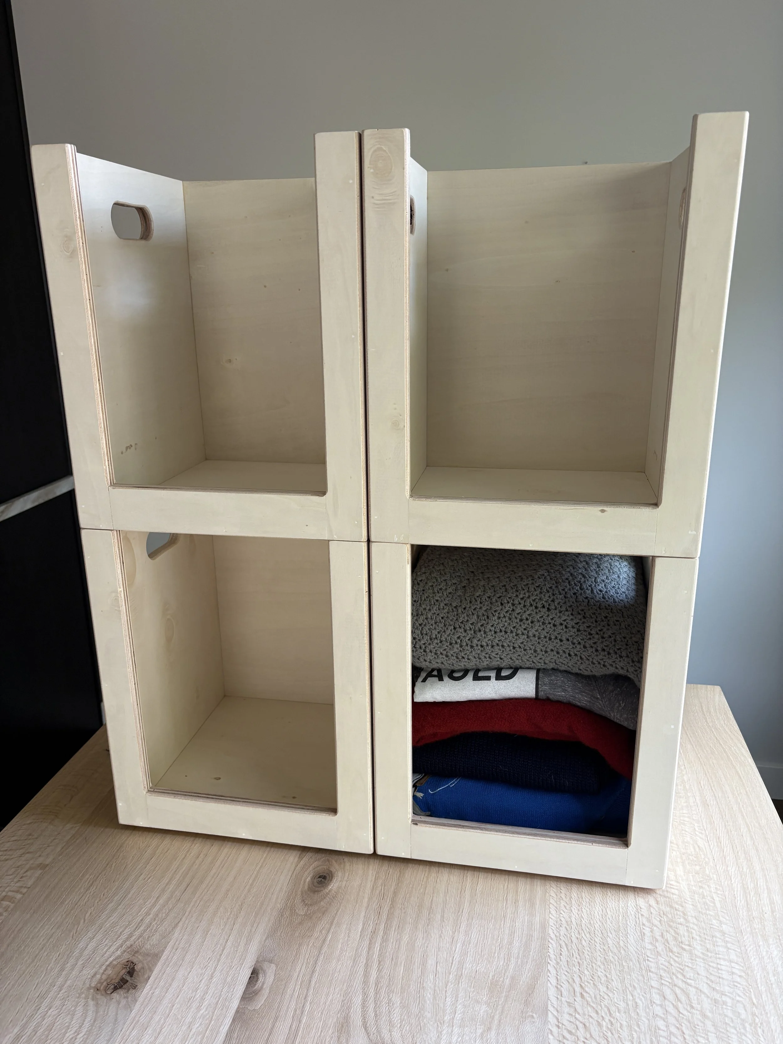Unfinished plywood modular closet organization stacking boxes.