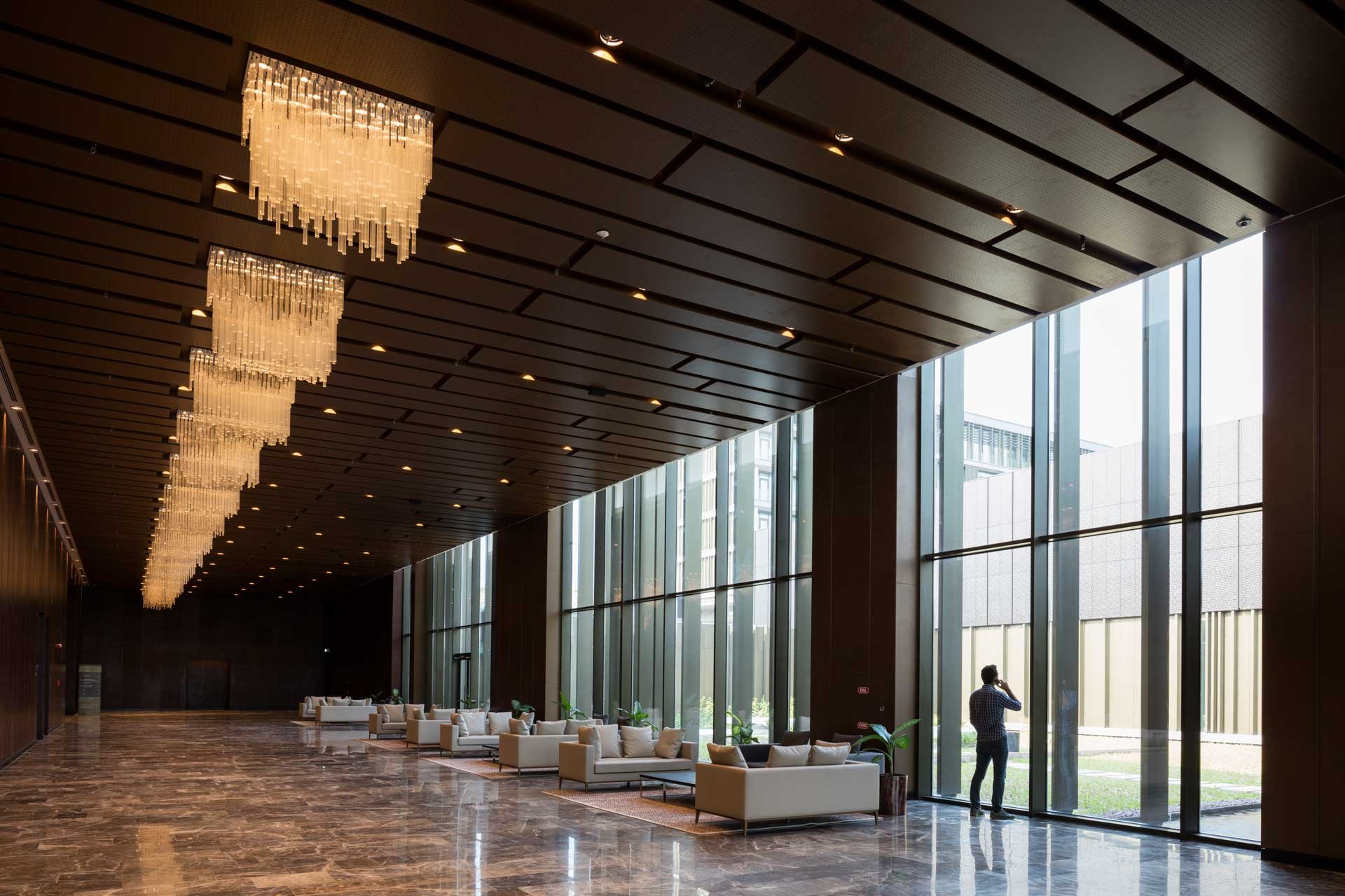 10-Avci-Architects_Kintele_Presentation_hall_Foyer.jpg