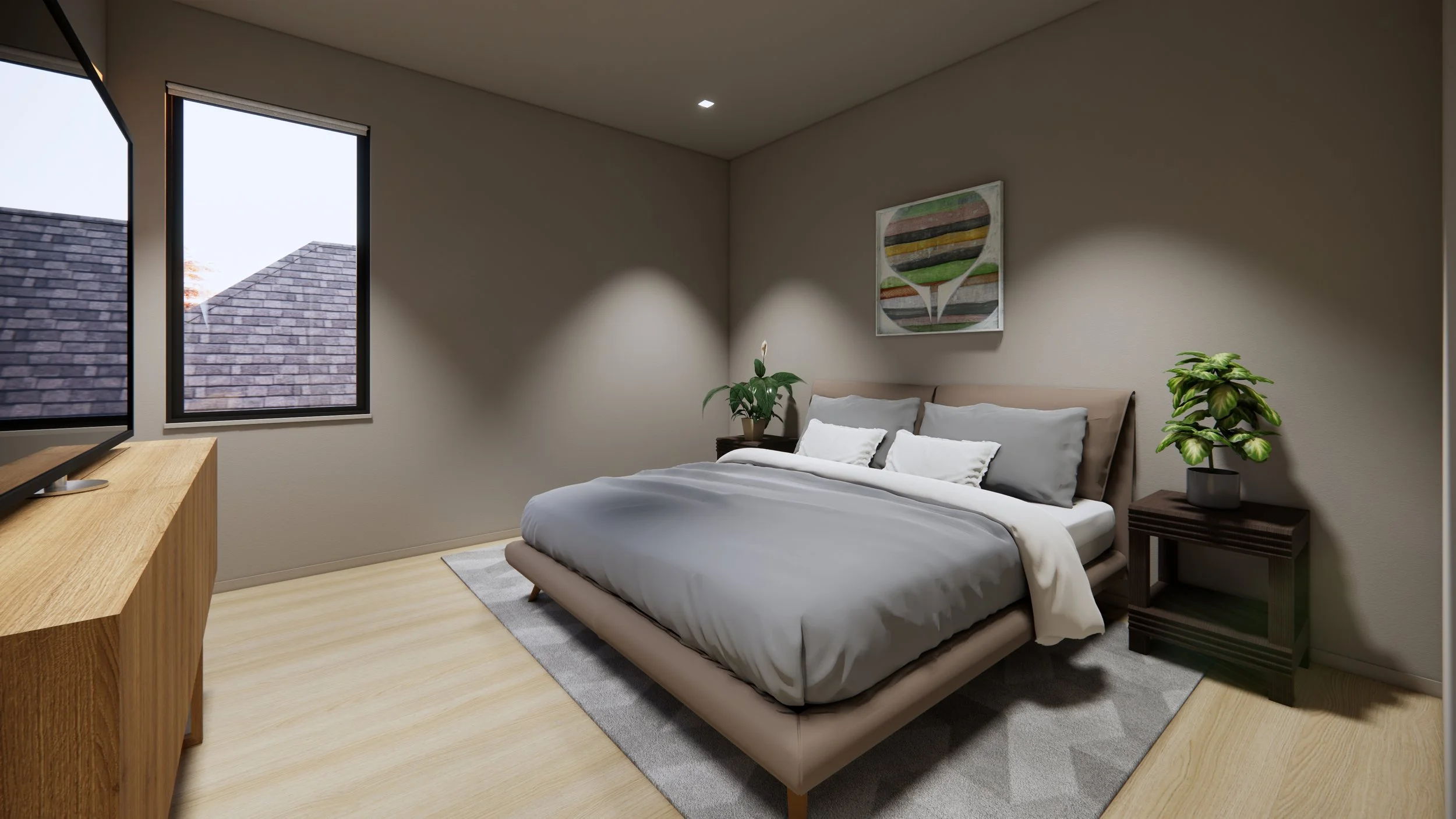 Modern bedroom with beige walls, wooden floor, a bed with gray bedding and pillows, two potted plants on nightstands, and a colorful abstract painting above the bed. There are two large windows showing rooftops outside.