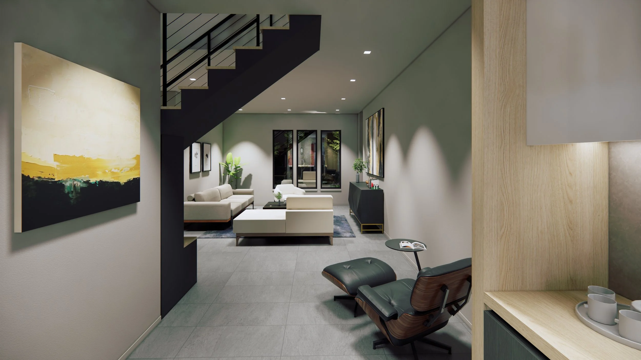 A modern living room with a black staircase, abstract art on the walls, a white sofa, a black cabinet, a lounge chair with a small side table, and large windows.