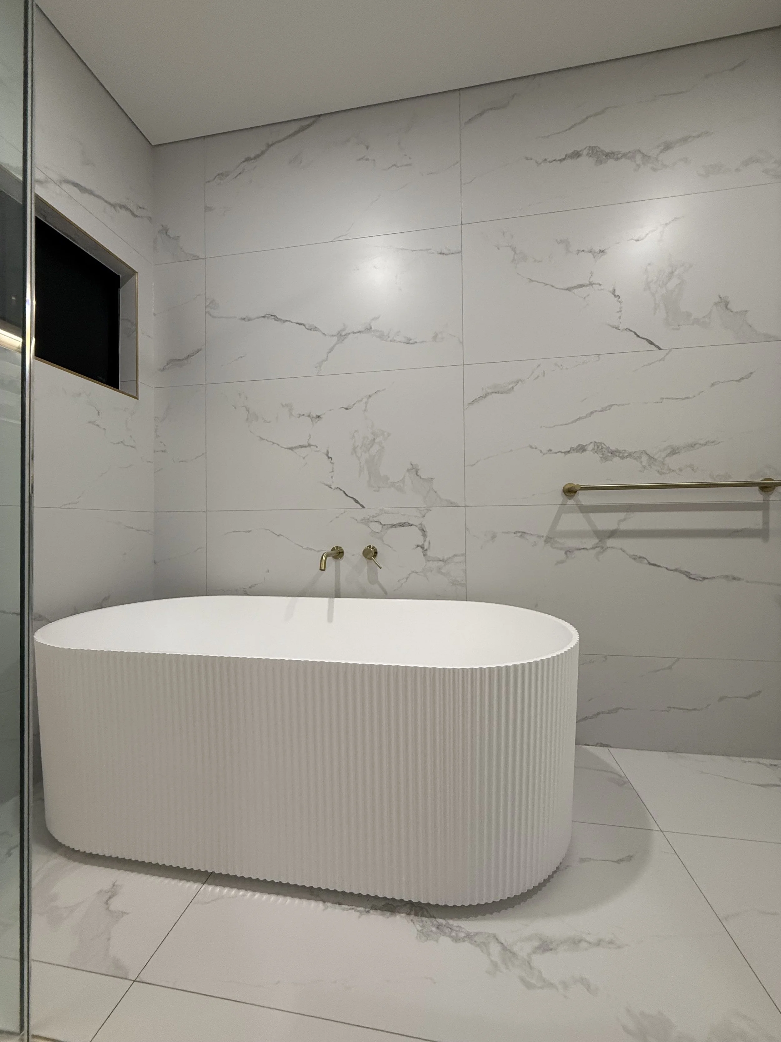 Commercial tiling installation for a business in Darwin, NT.