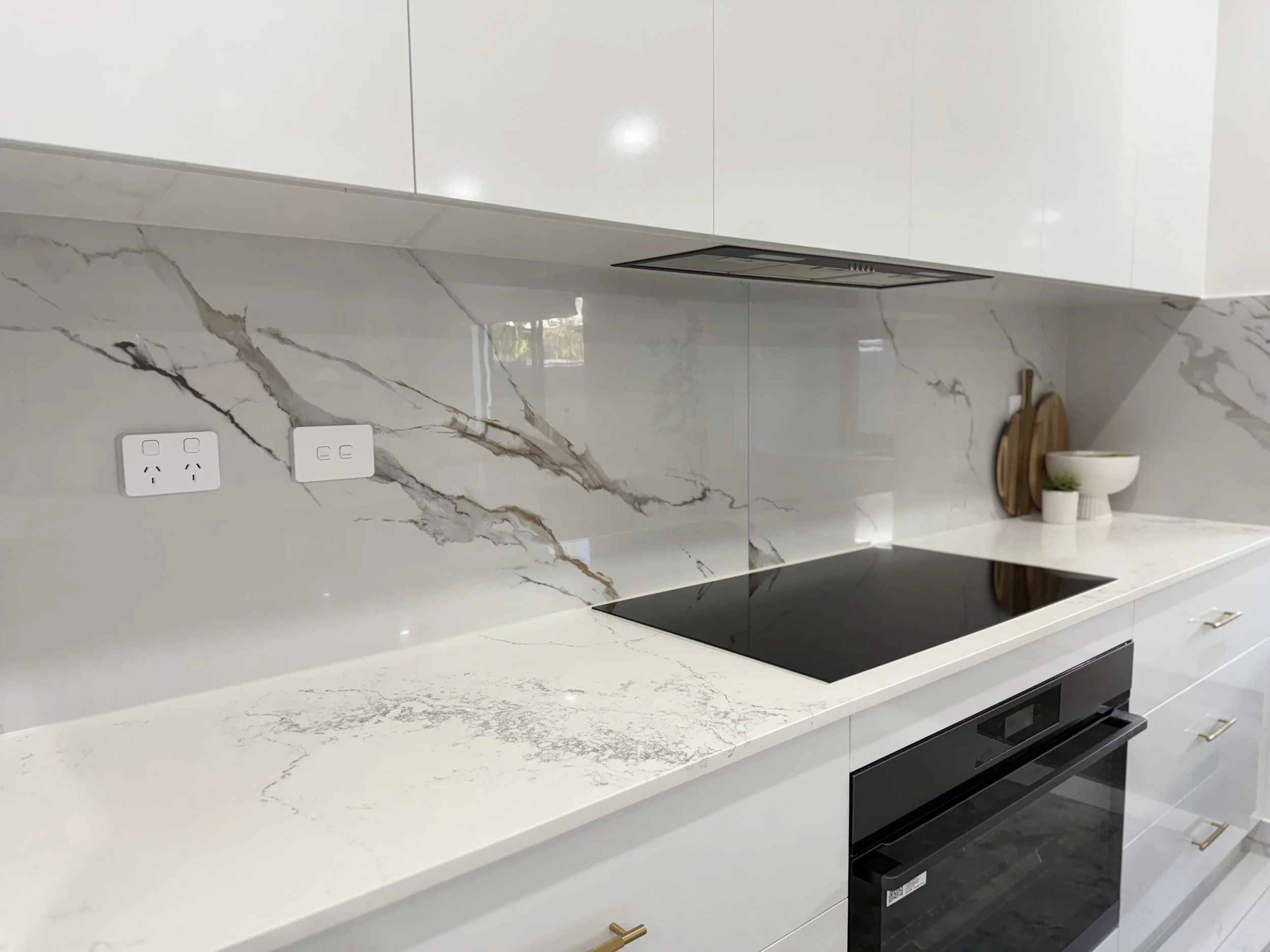 Modern bathroom floor and wall tiling renovation in Darwin, NT.
