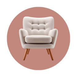 Sillón blanco con patas de madera sobre fondo rosa