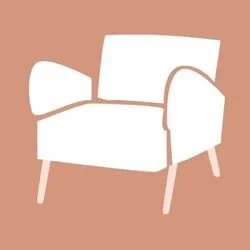 Sofá blanco con cojín en un fondo beige