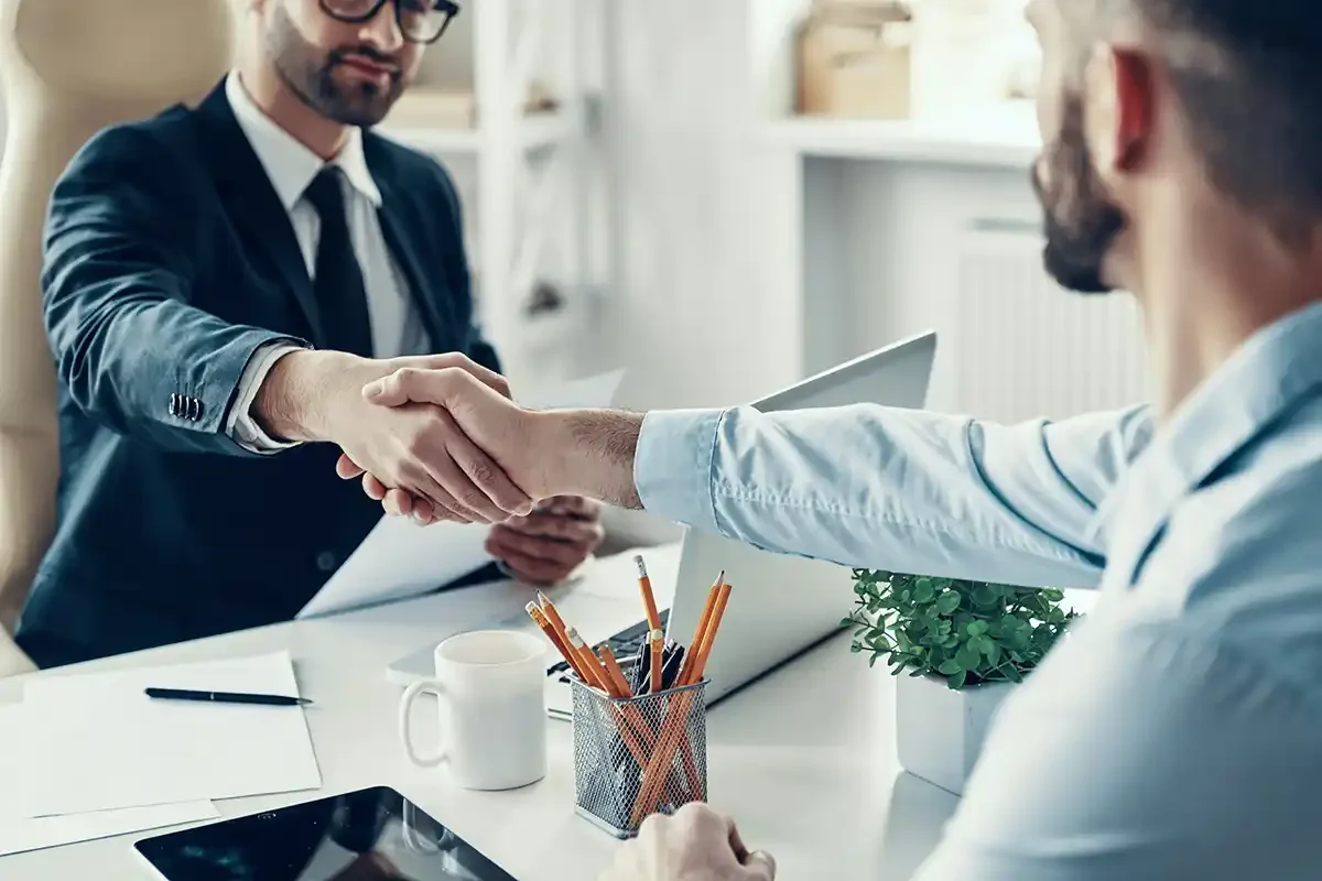 A recruitment consultant meeting a candidate in the UK