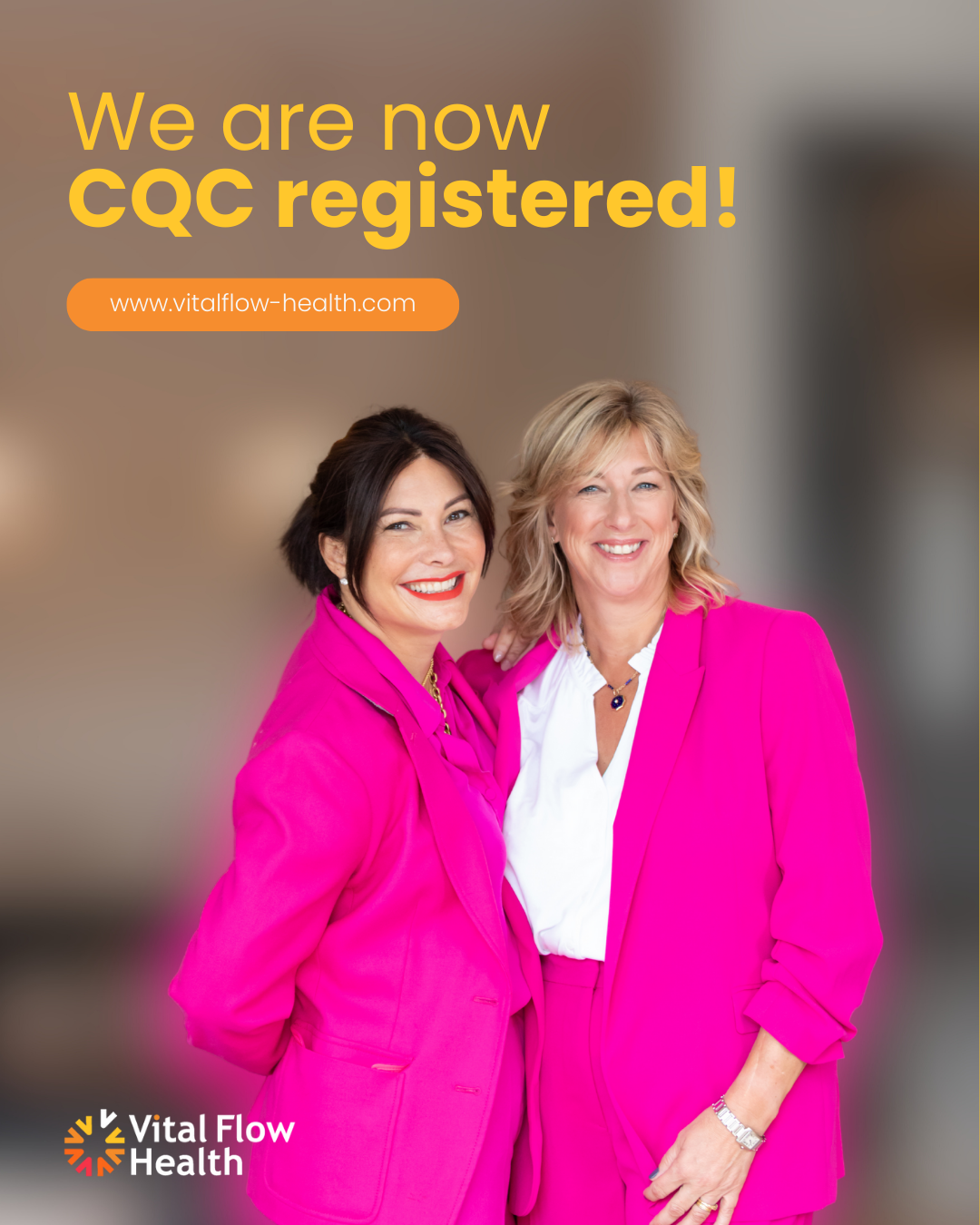 Two women wearing bright pink suits smiling and standing close together against a blurred background. Text overlay announces 'We are now CQC registered!' with a website link and the Vital Flow Health logo.