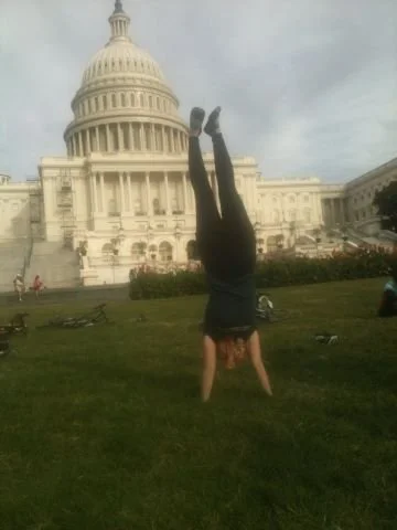 Handstands with terrible form in front of the US Capitol after meeting up with the Climate Ride